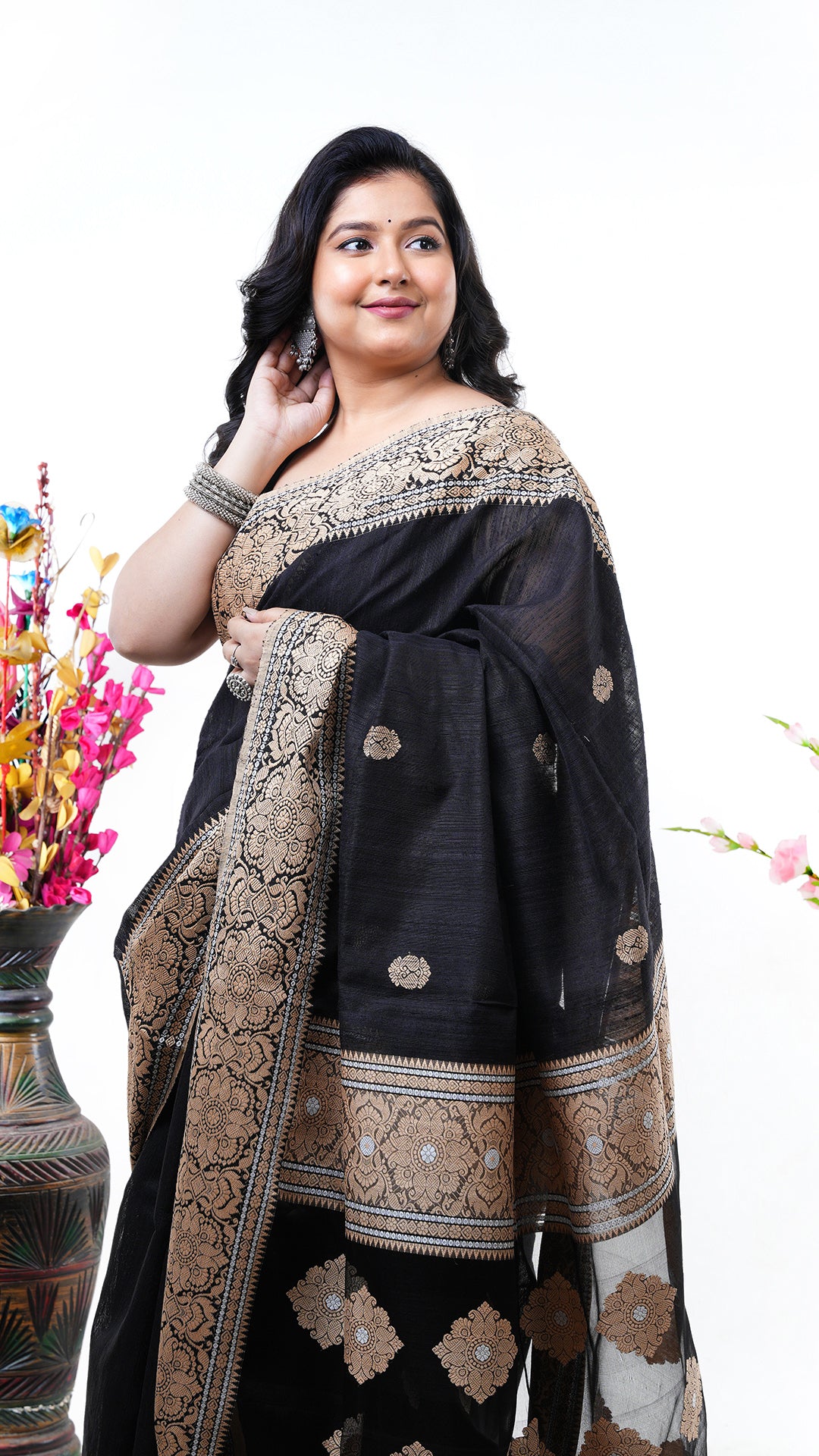 A black raw silk saree