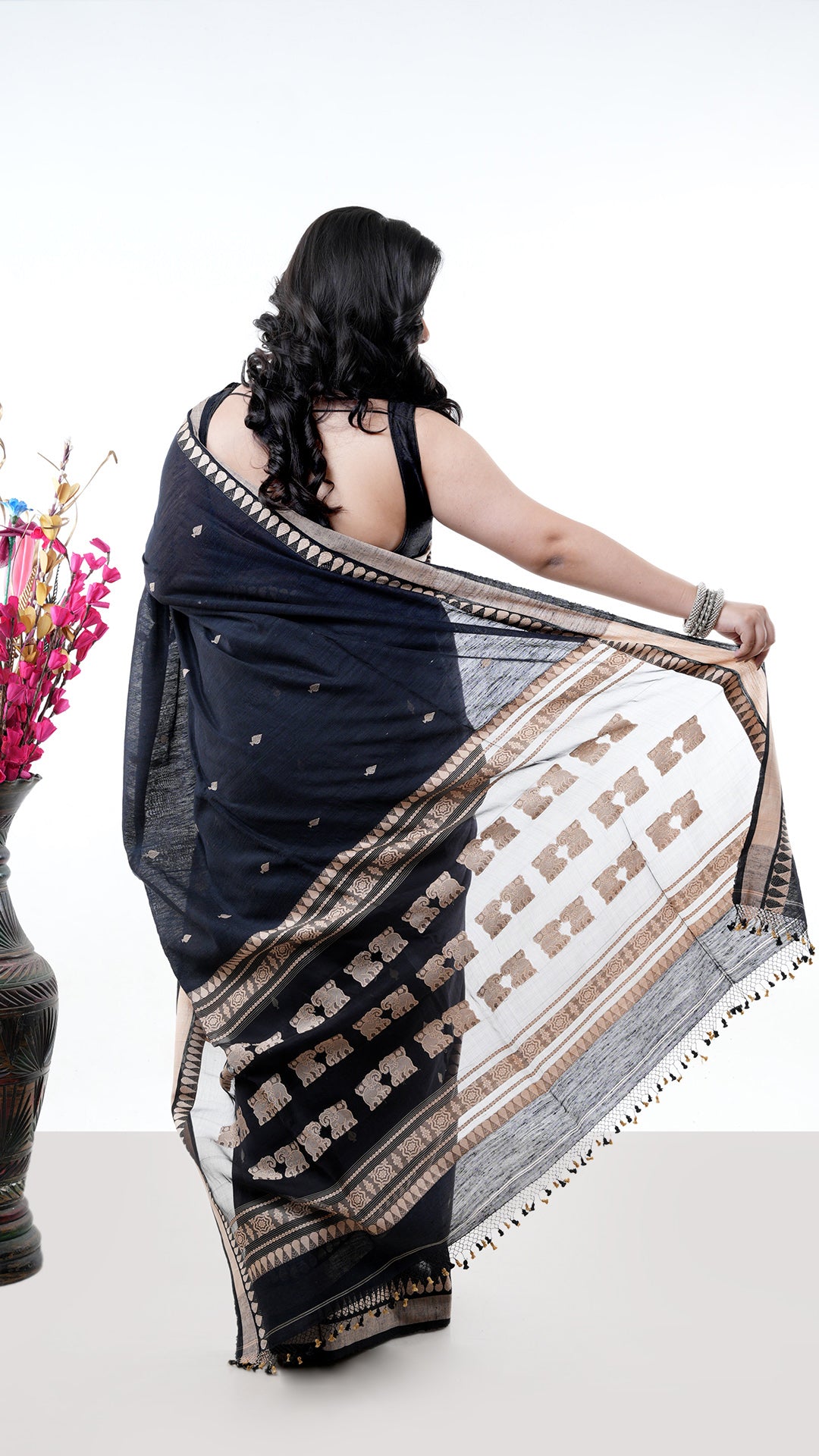 A black raw silk saree