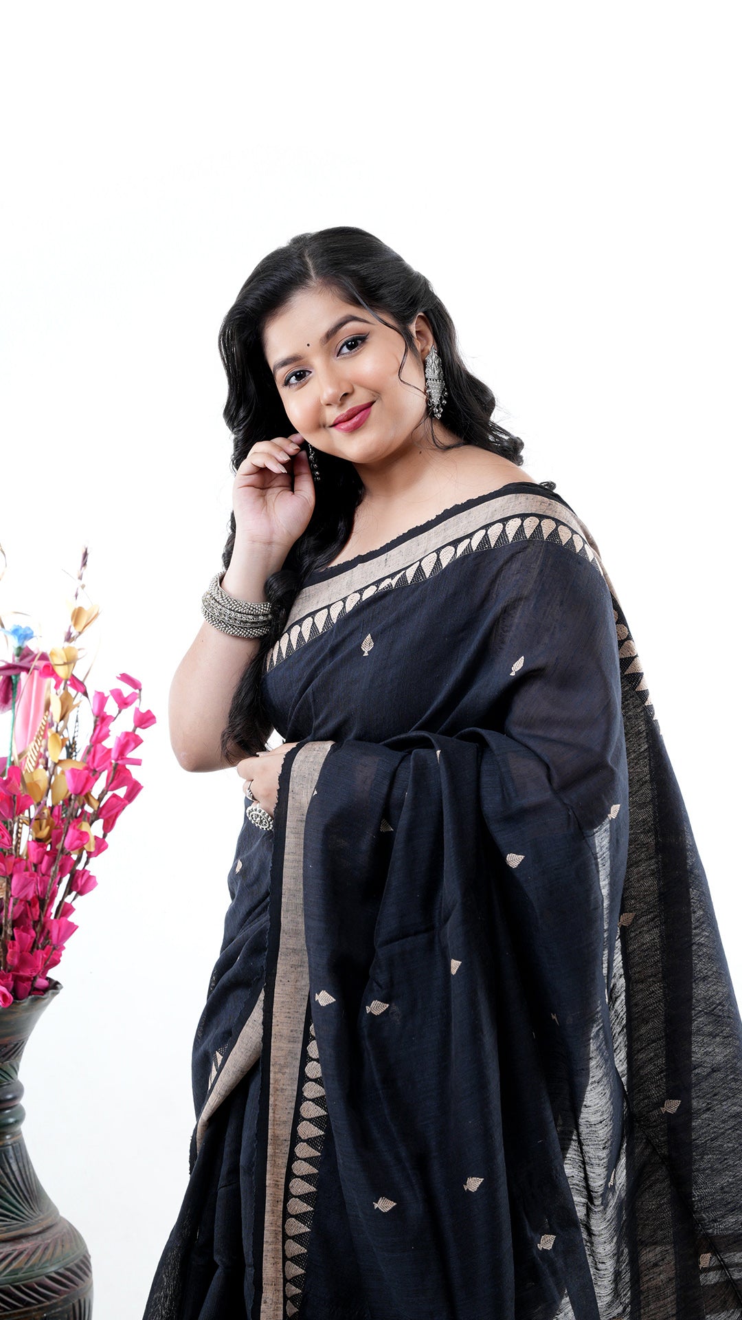 A black raw silk saree