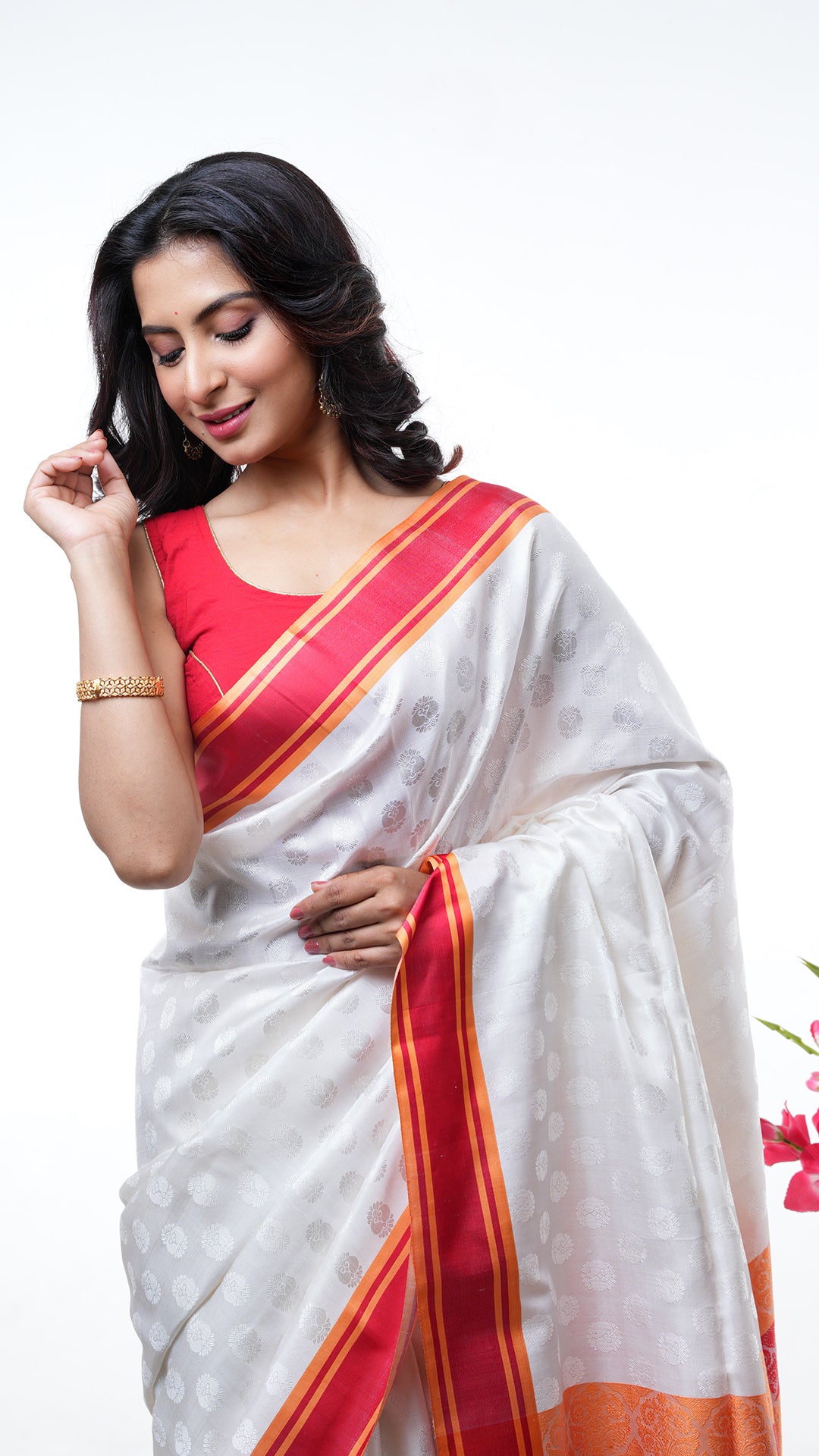 A white and red silk saree