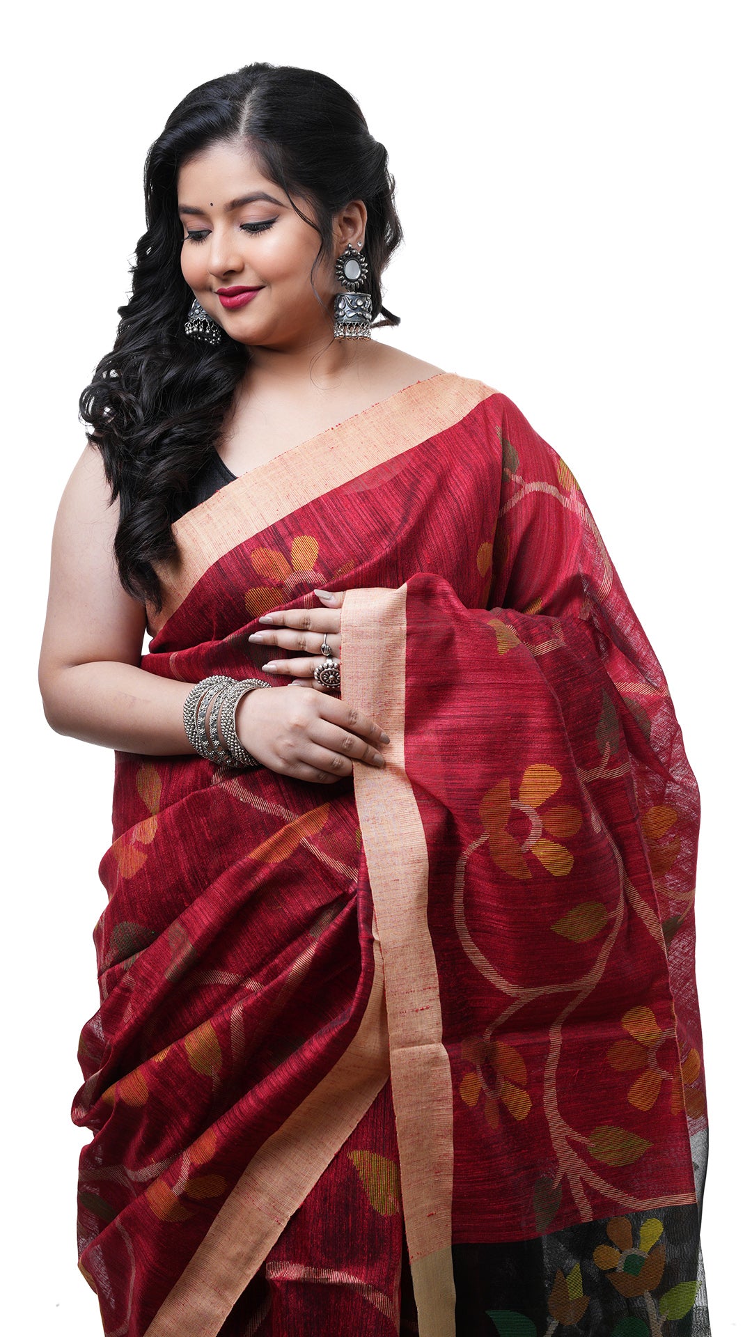 A blackish red raw silk saree