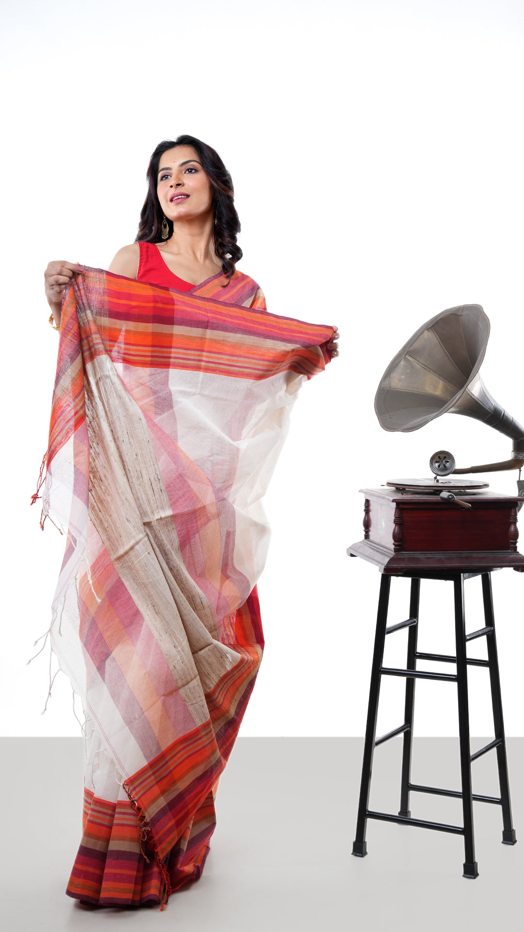 An off white tangail saree