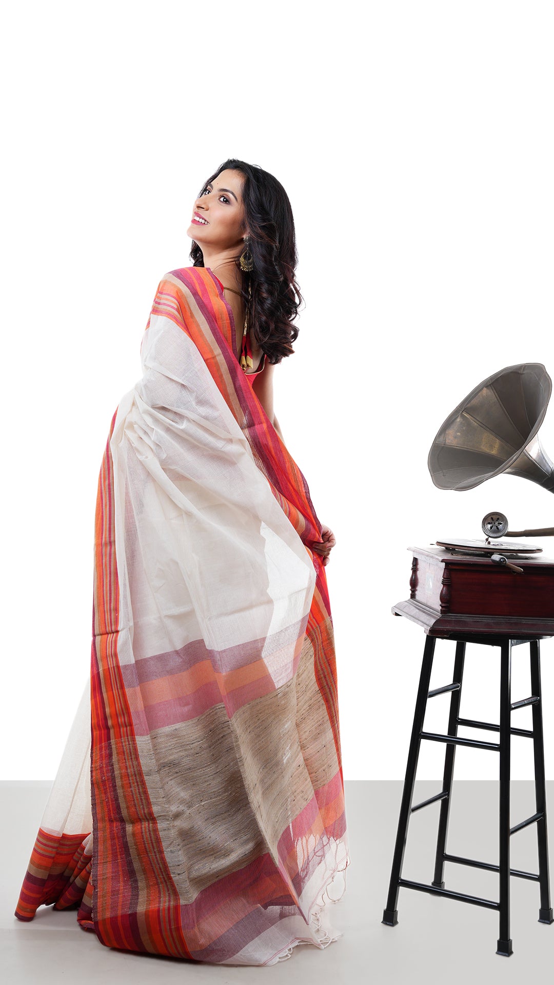 An off white tangail saree