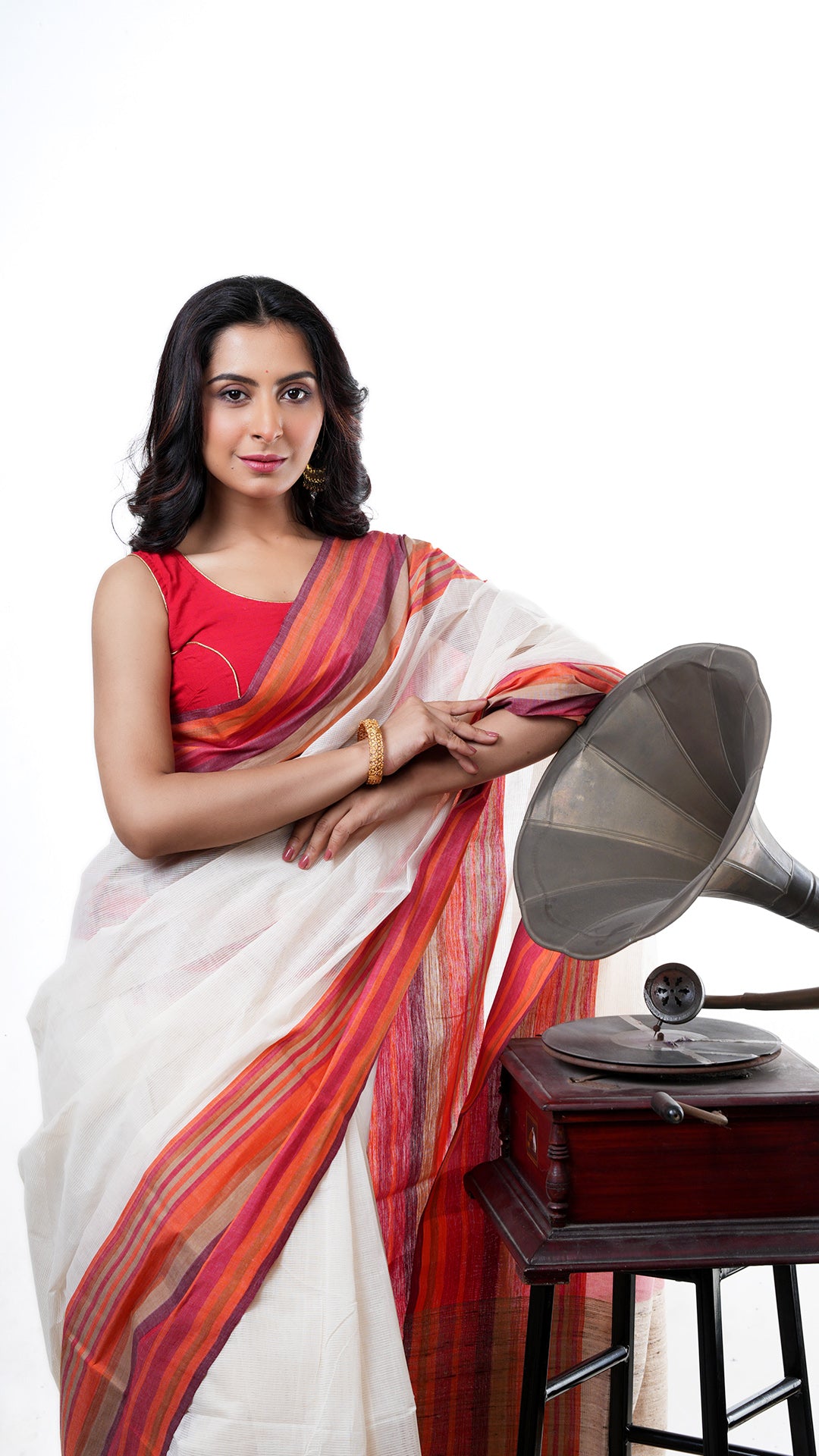 An off white tangail saree