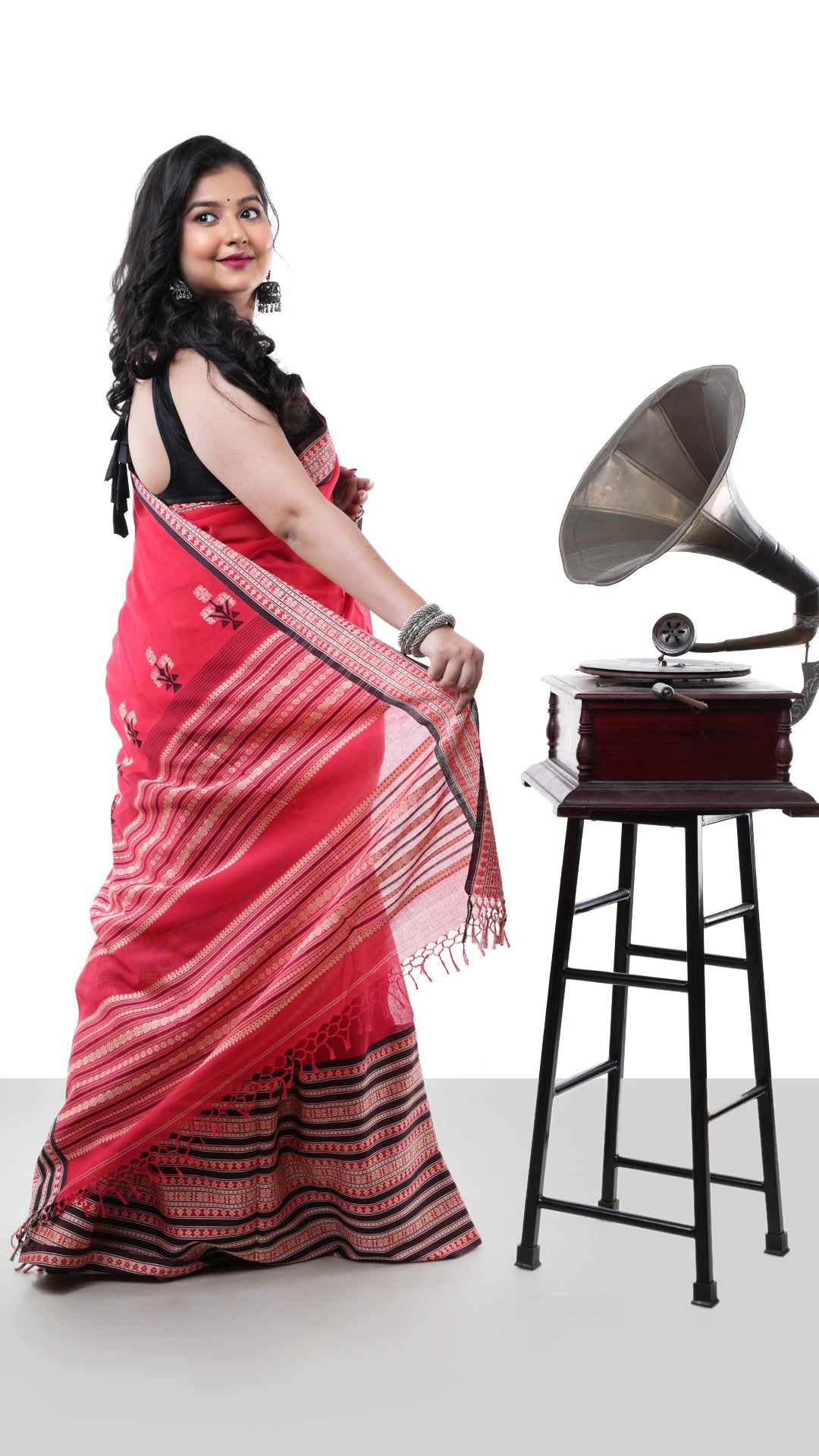 A red tangail saree in soft cotton