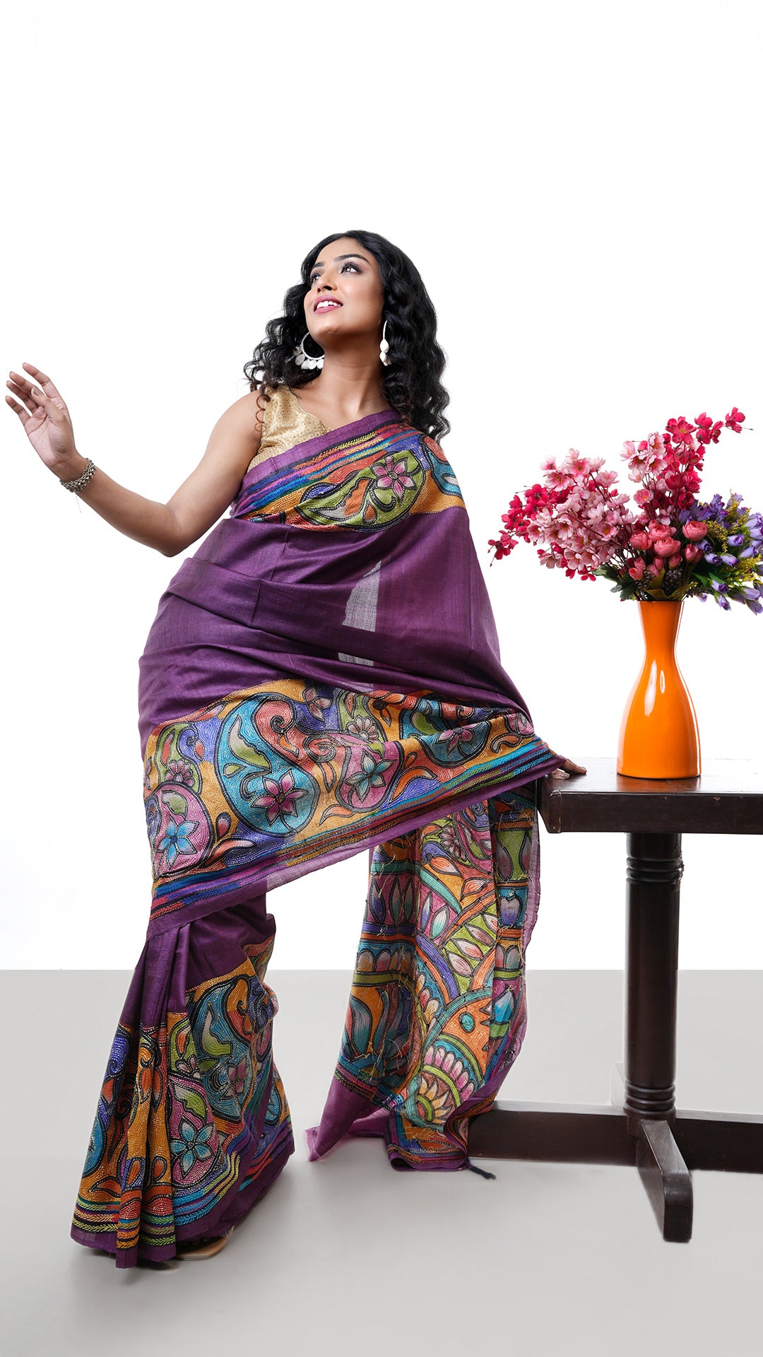 A kantha in aubergine colour