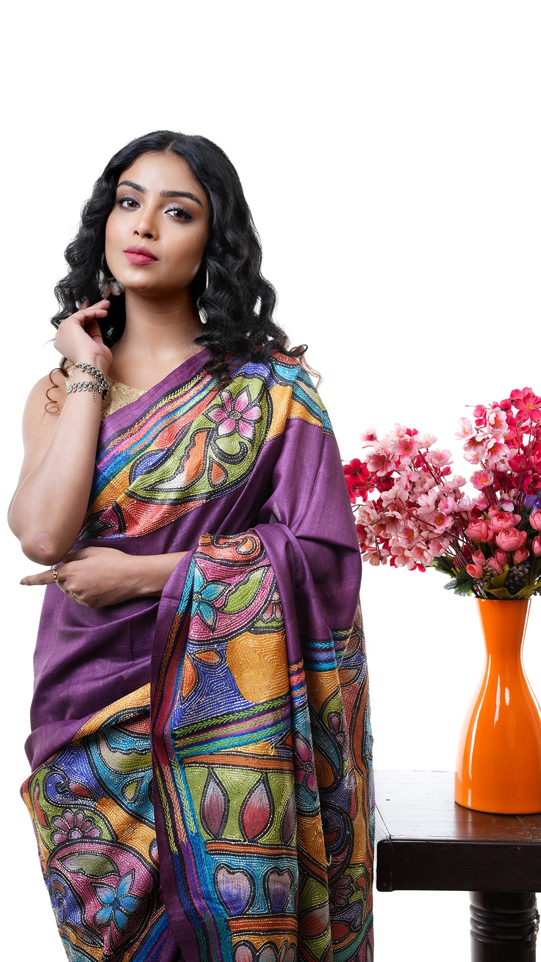 A kantha in aubergine colour