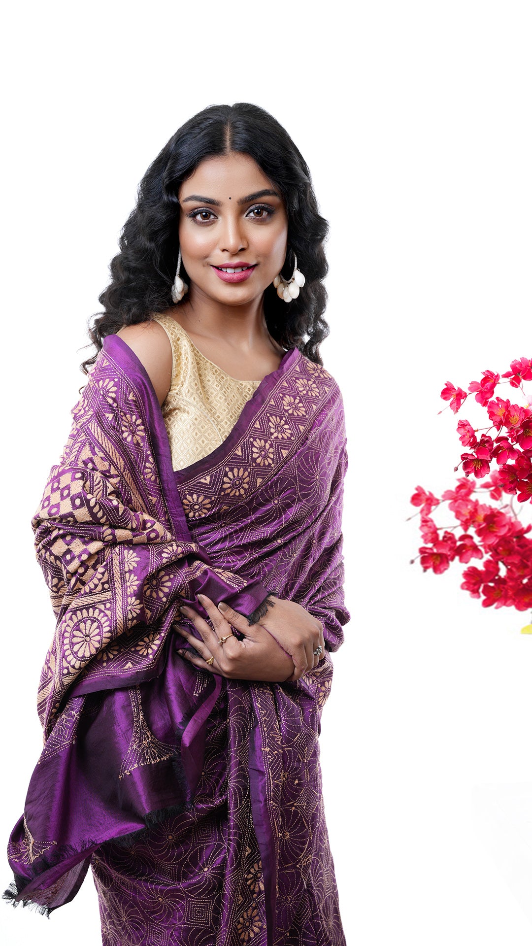 A magenta silk kantha saree