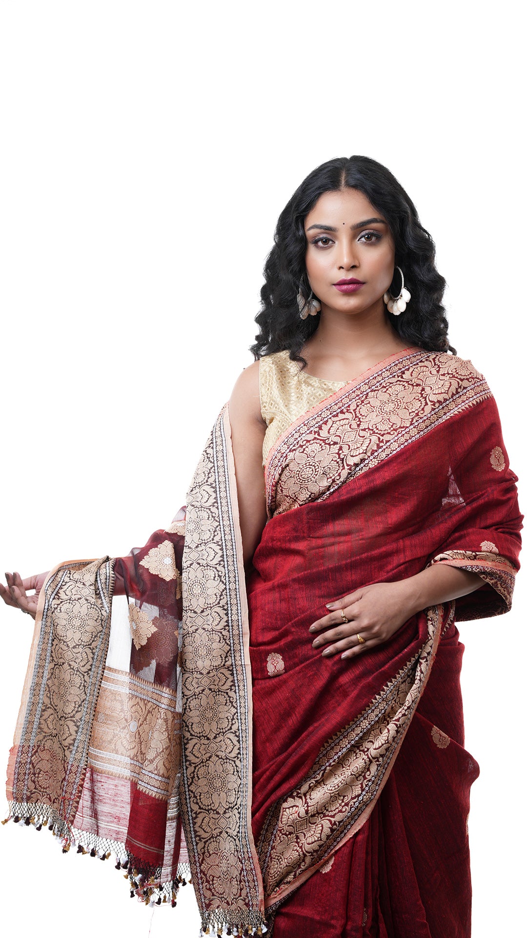 A raw silk saree in maroon colour