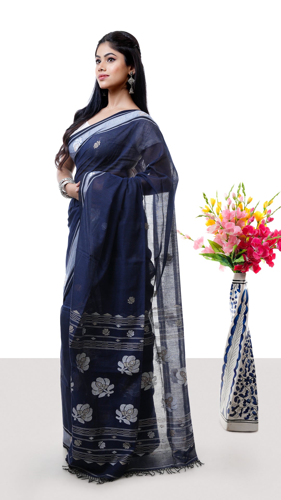 A midnight blue tangail saree