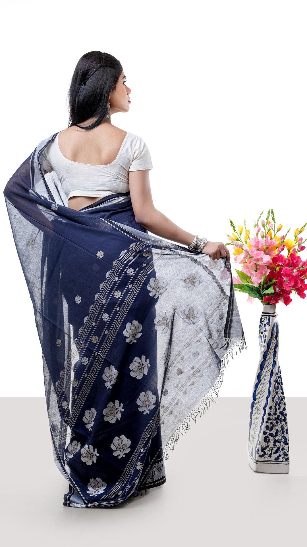 A midnight blue tangail saree