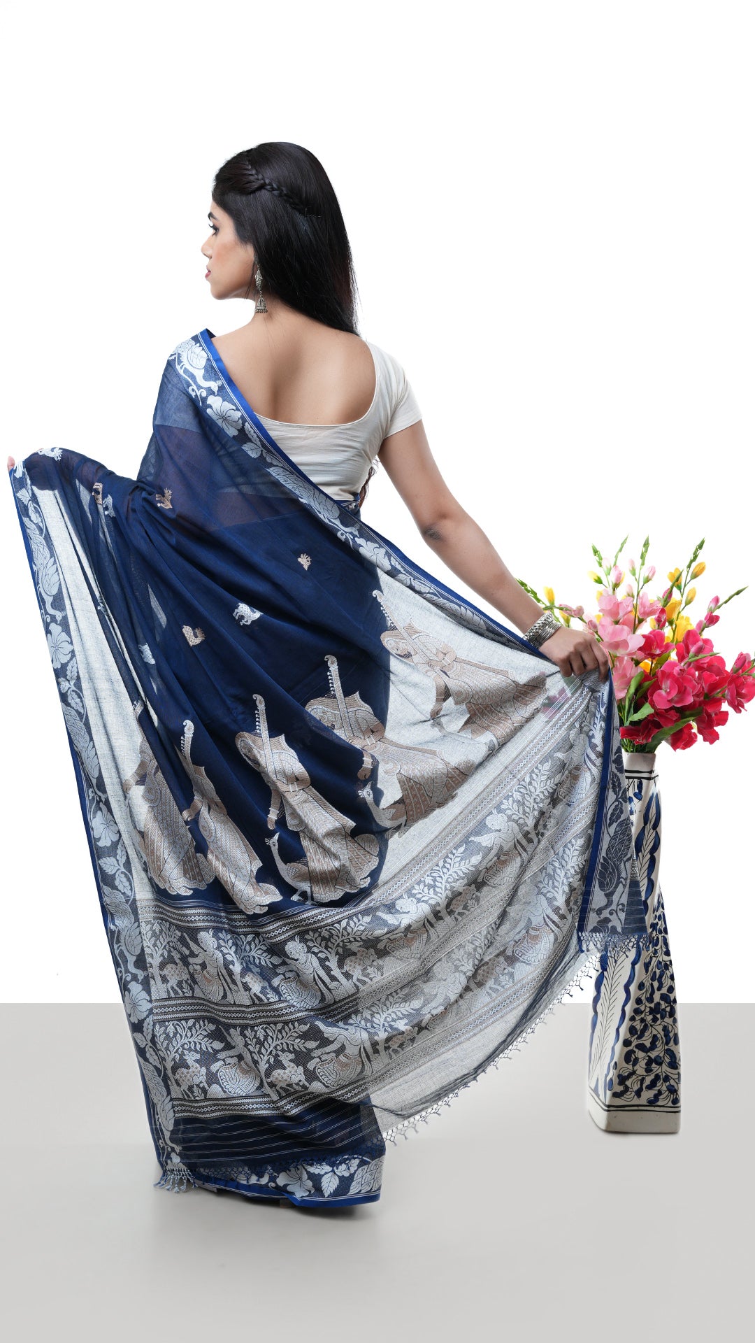 A deep blue baluchari saree