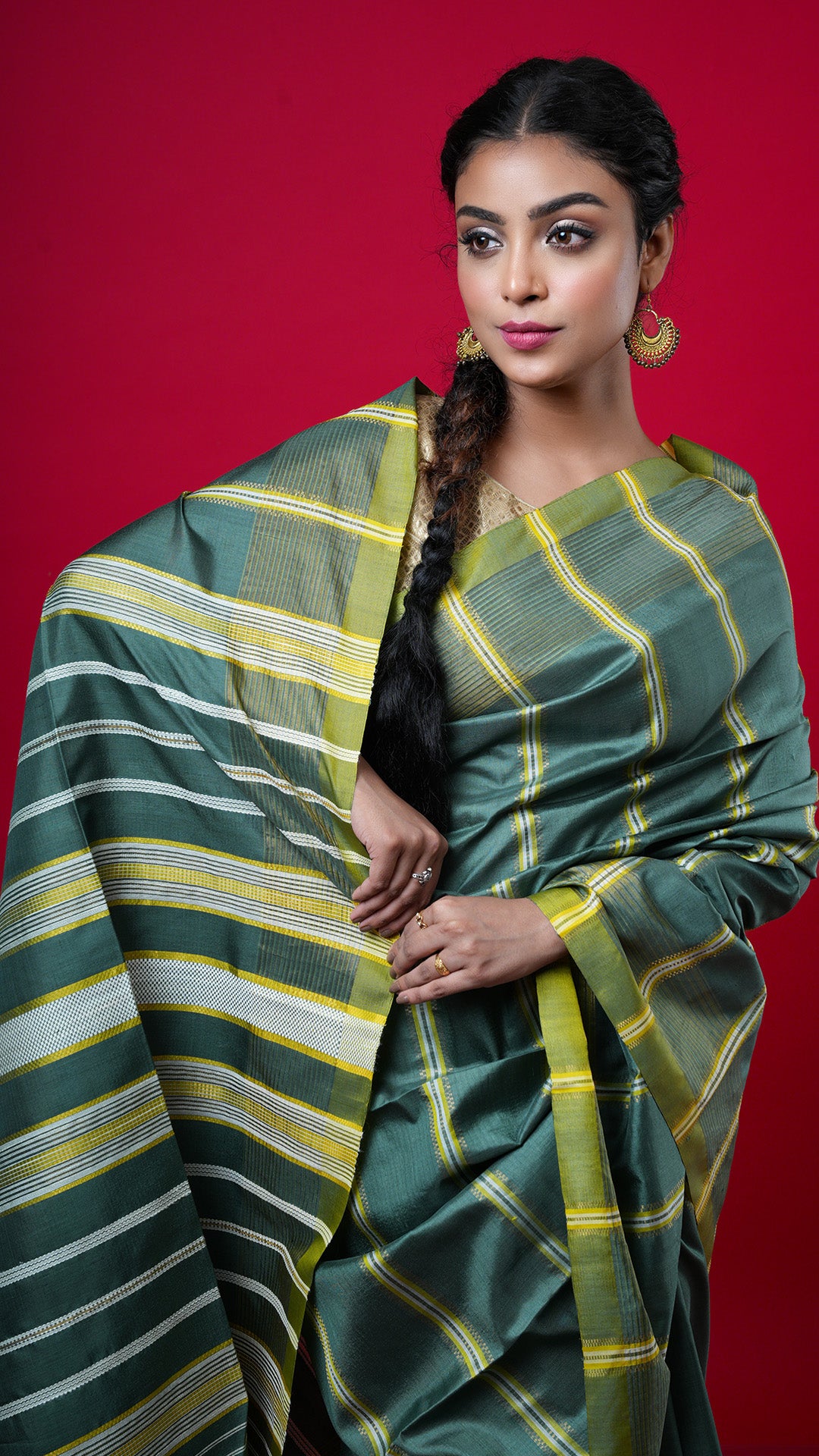 A green coloured silk saree