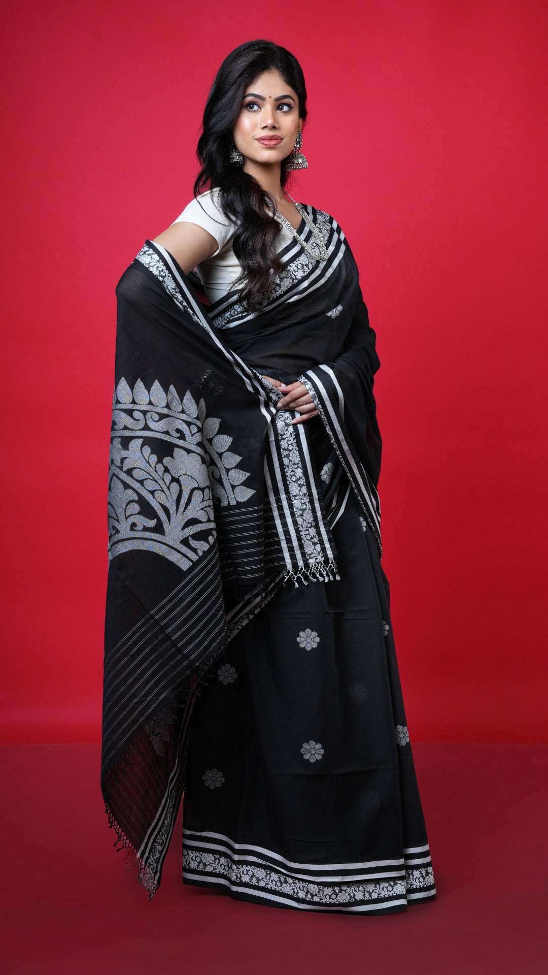 A black and white soft tangail saree