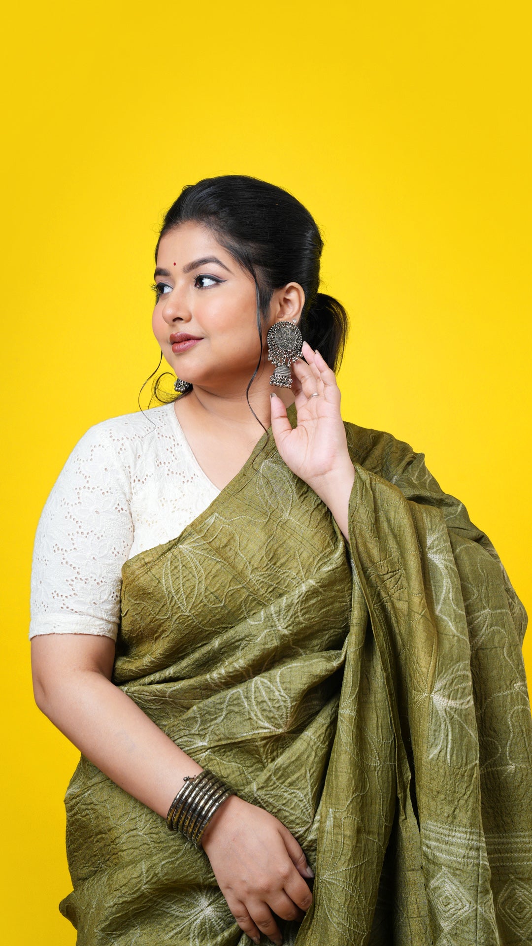 A mehendi green shibori saree