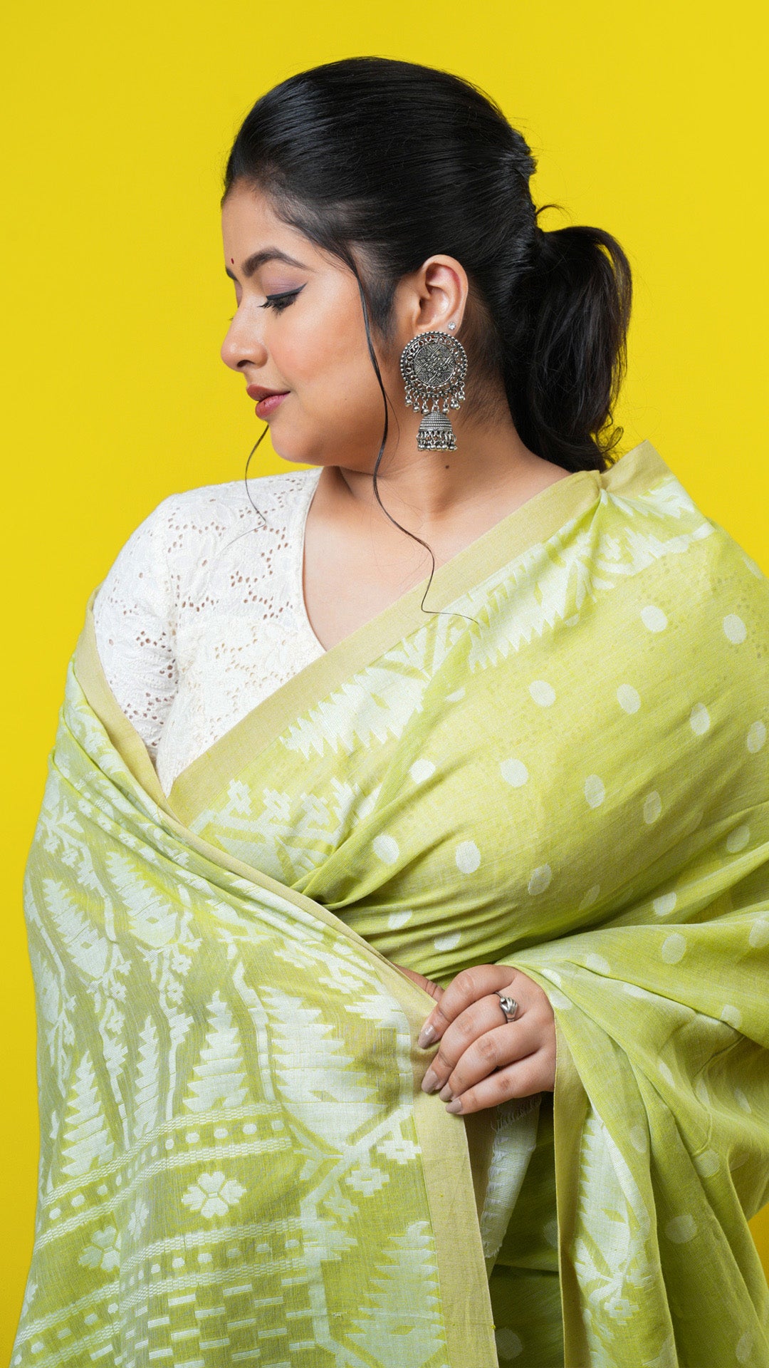 A green coloured saree