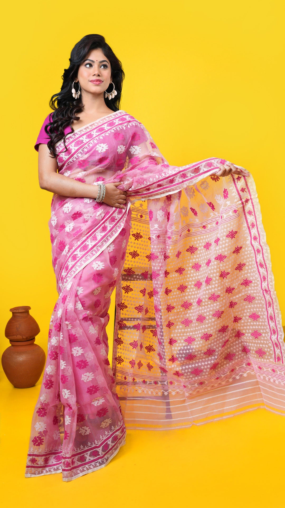 A light pink jamdani saree