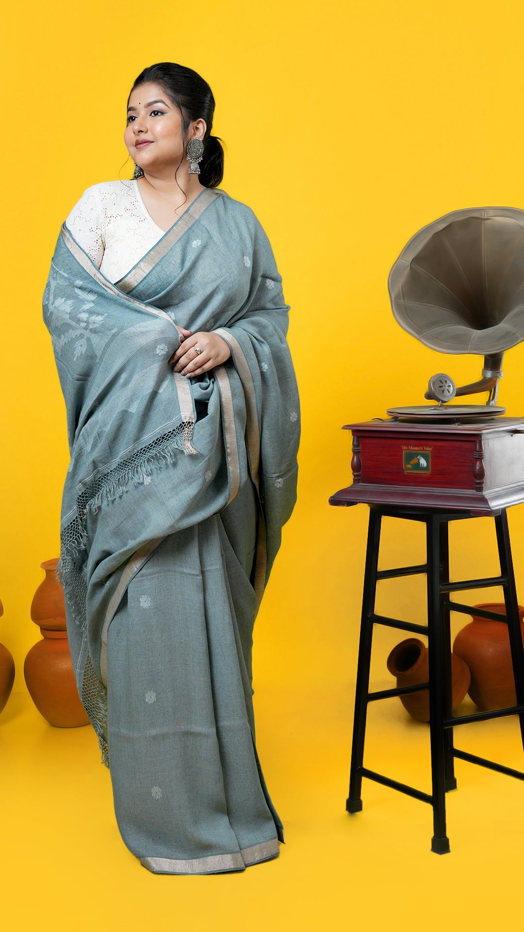 A pale green coloured linen saree
