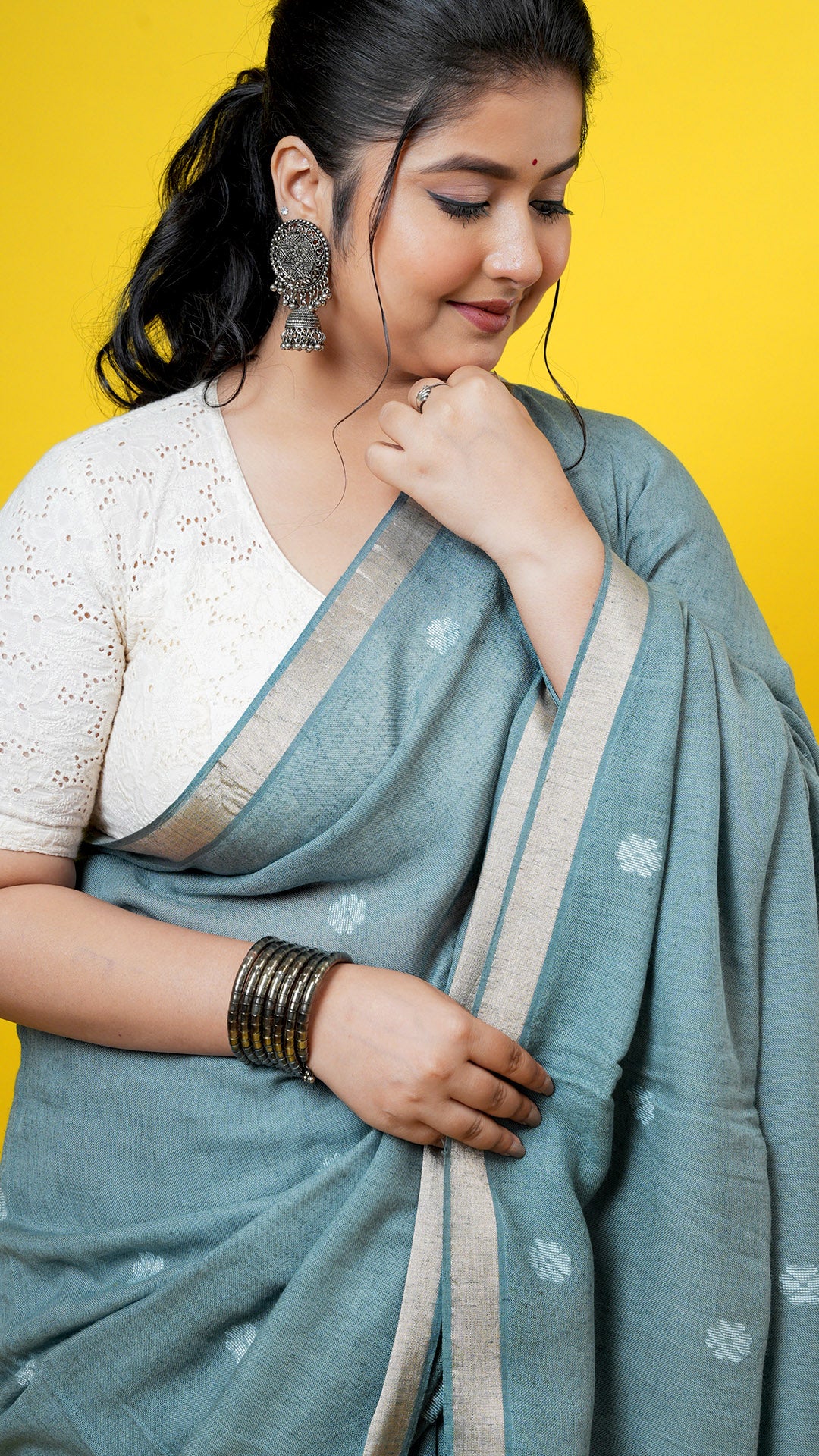 A pale green coloured linen saree