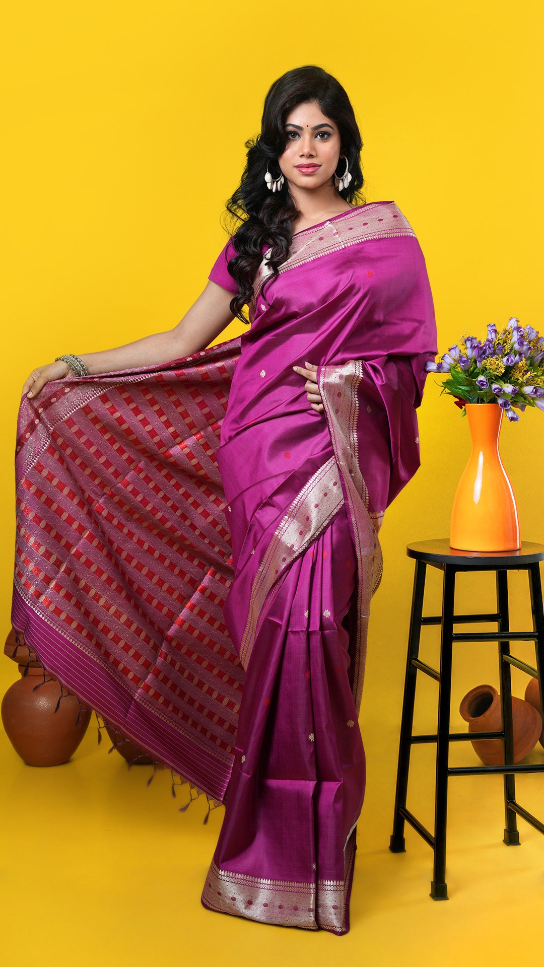 A magenta coloured tangail silk saree