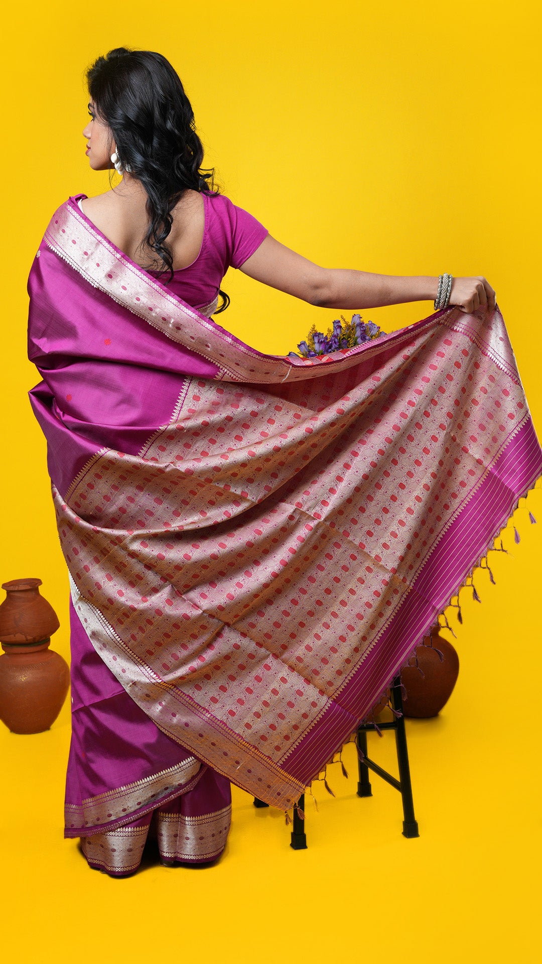 A magenta coloured tangail silk saree