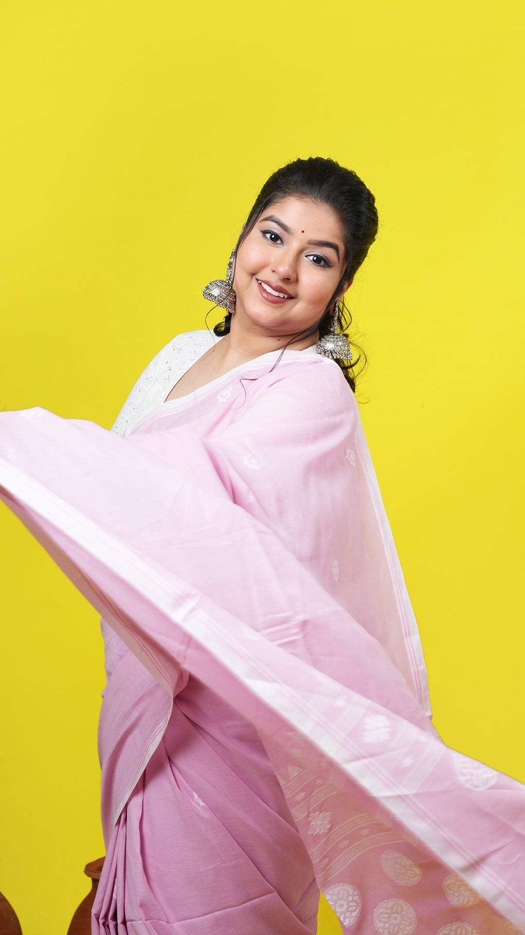 A light pink tangail saree