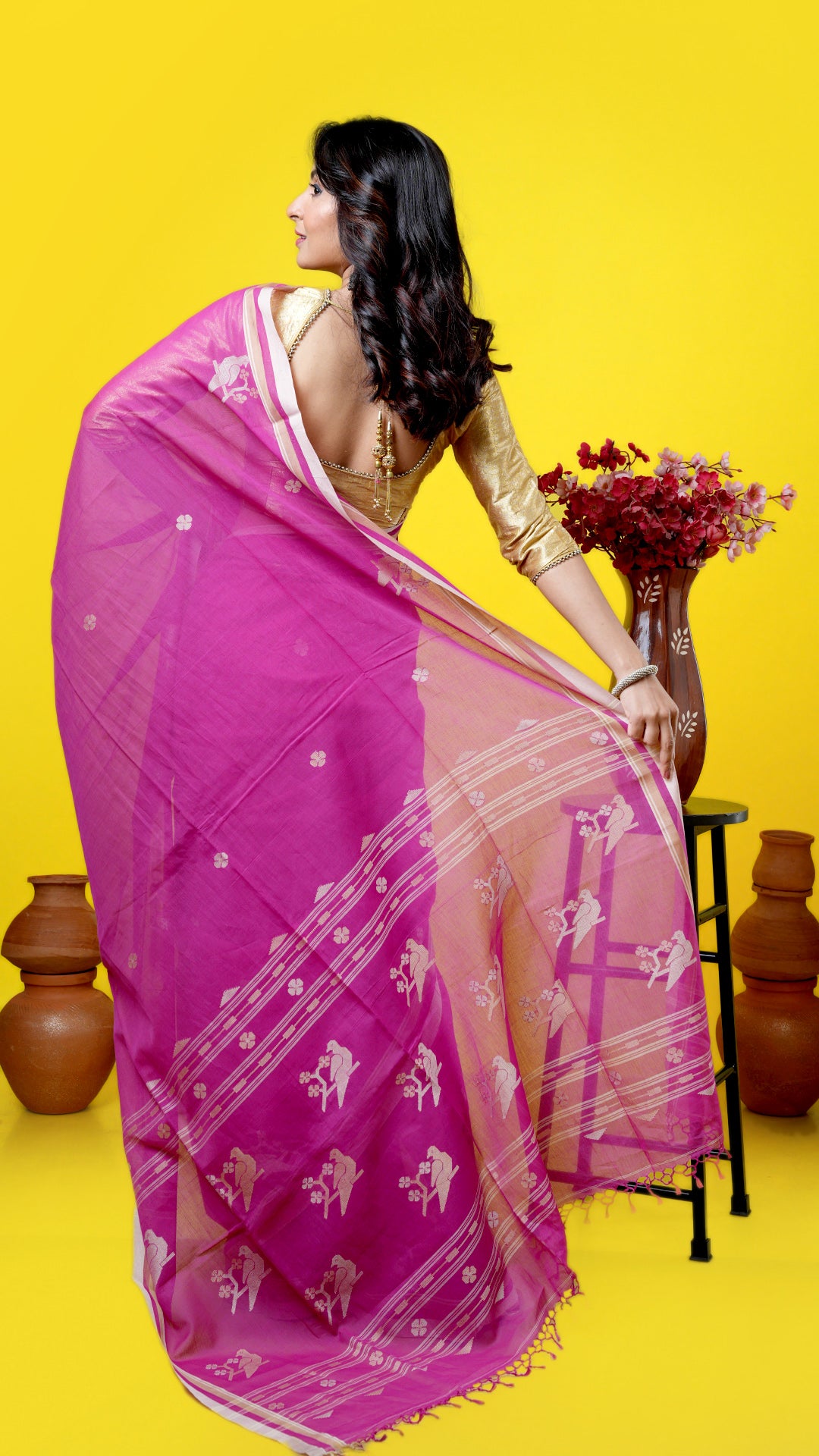 A magenta coloured soft cotton saree