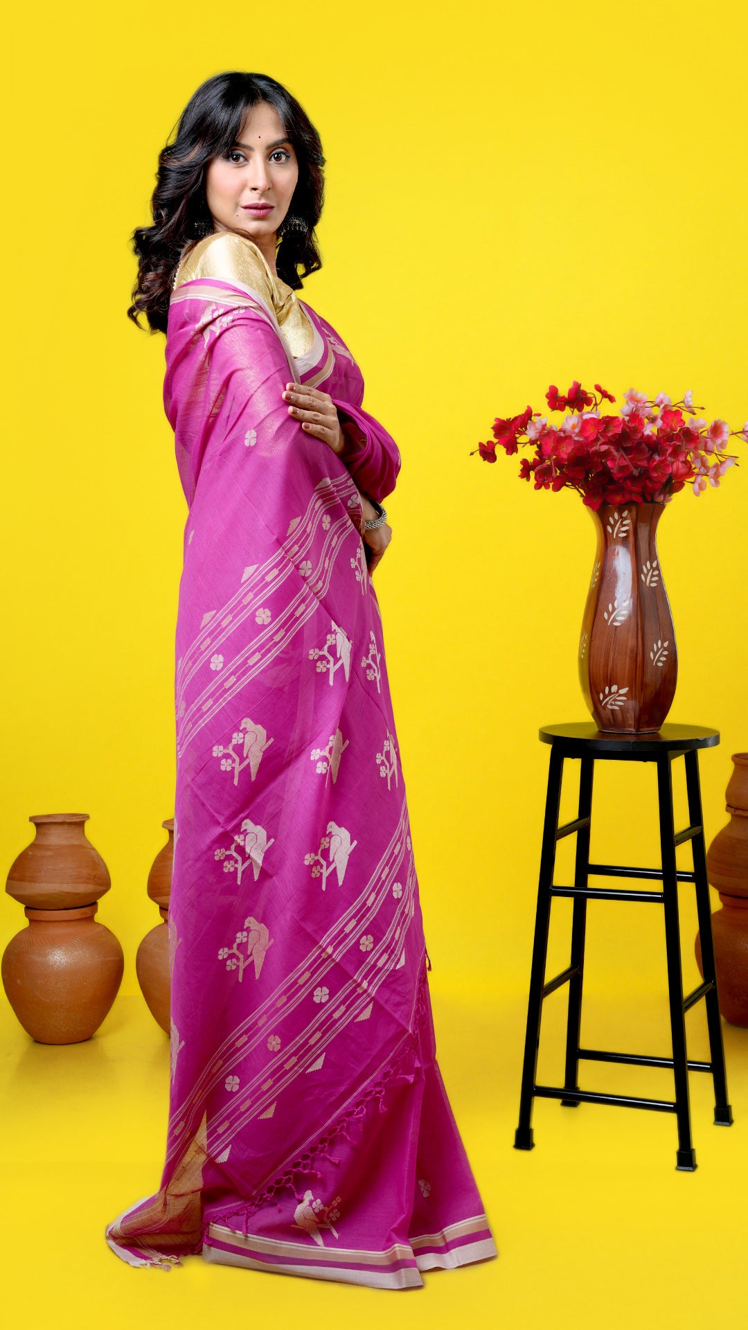 A magenta coloured soft cotton saree