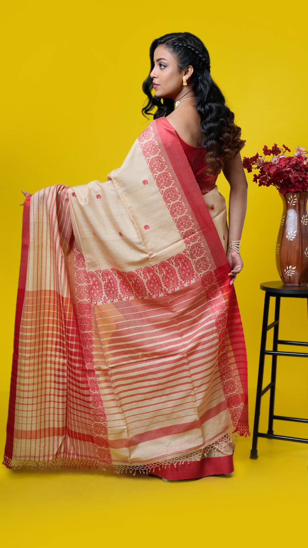 A tassar saree with red weave