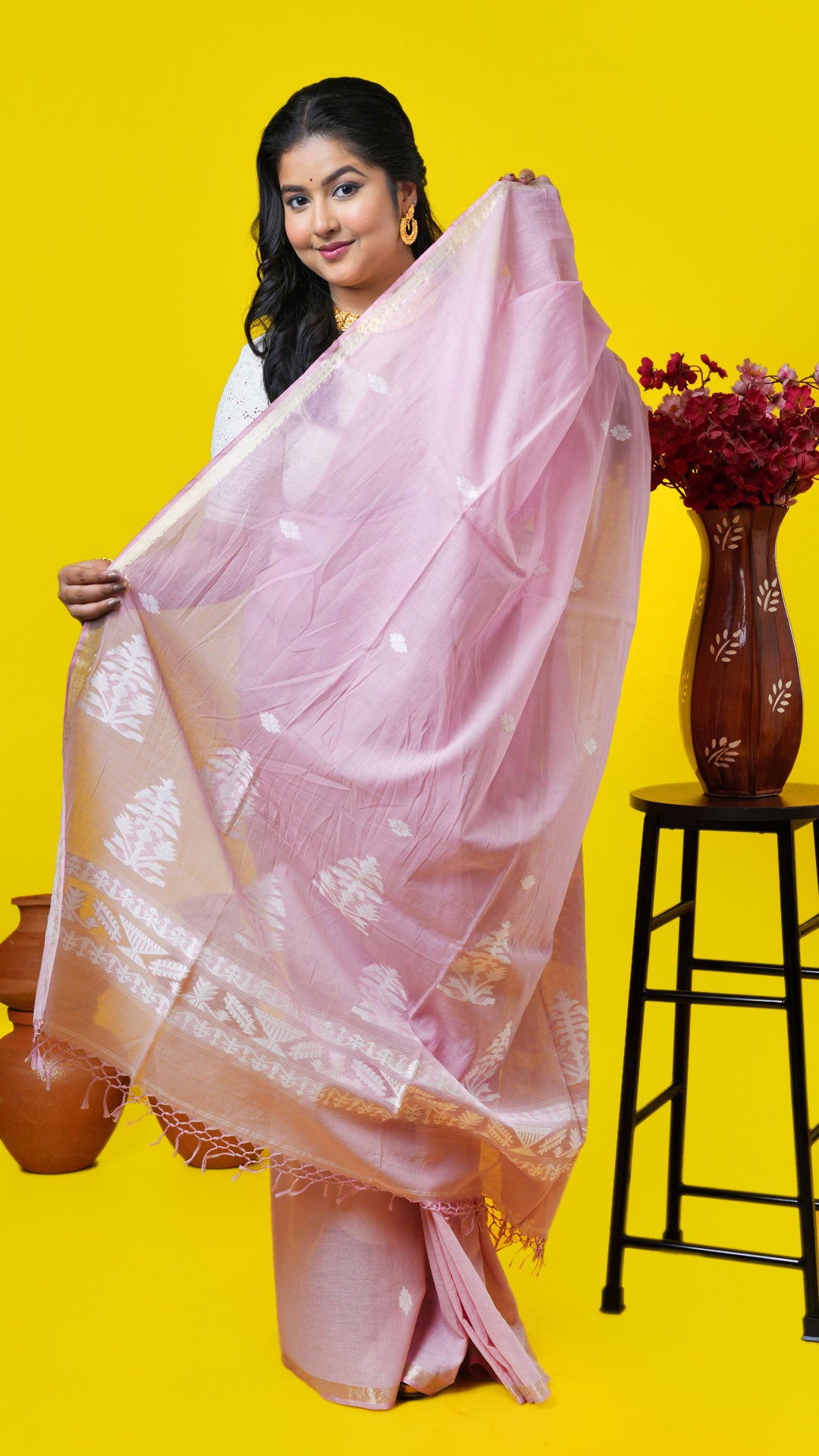 A light pink soft cotton saree