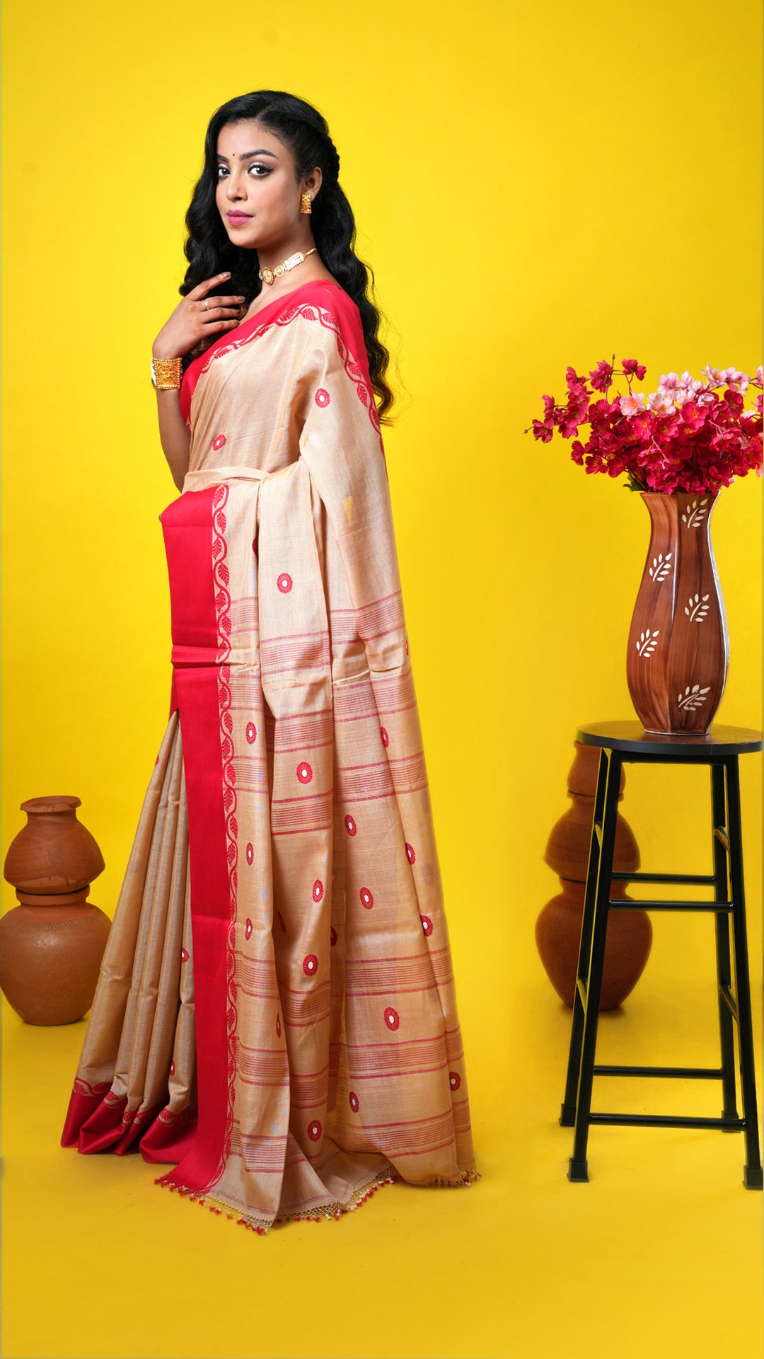 A tassar saree with flat red border