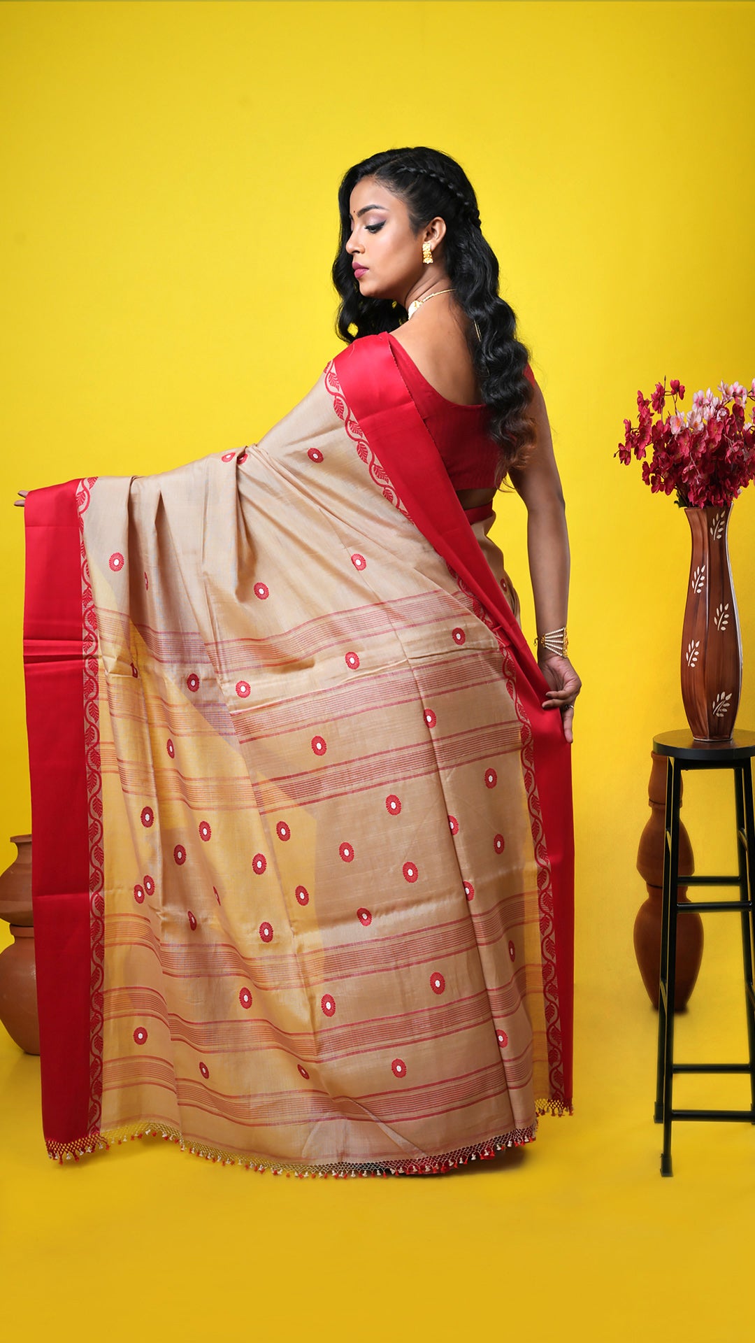 A tassar saree with flat red border
