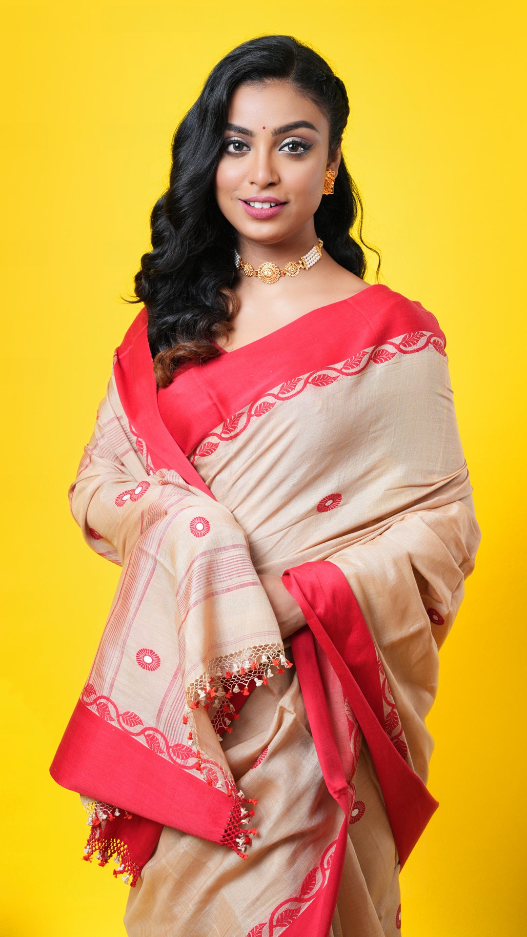 A tassar saree with flat red border