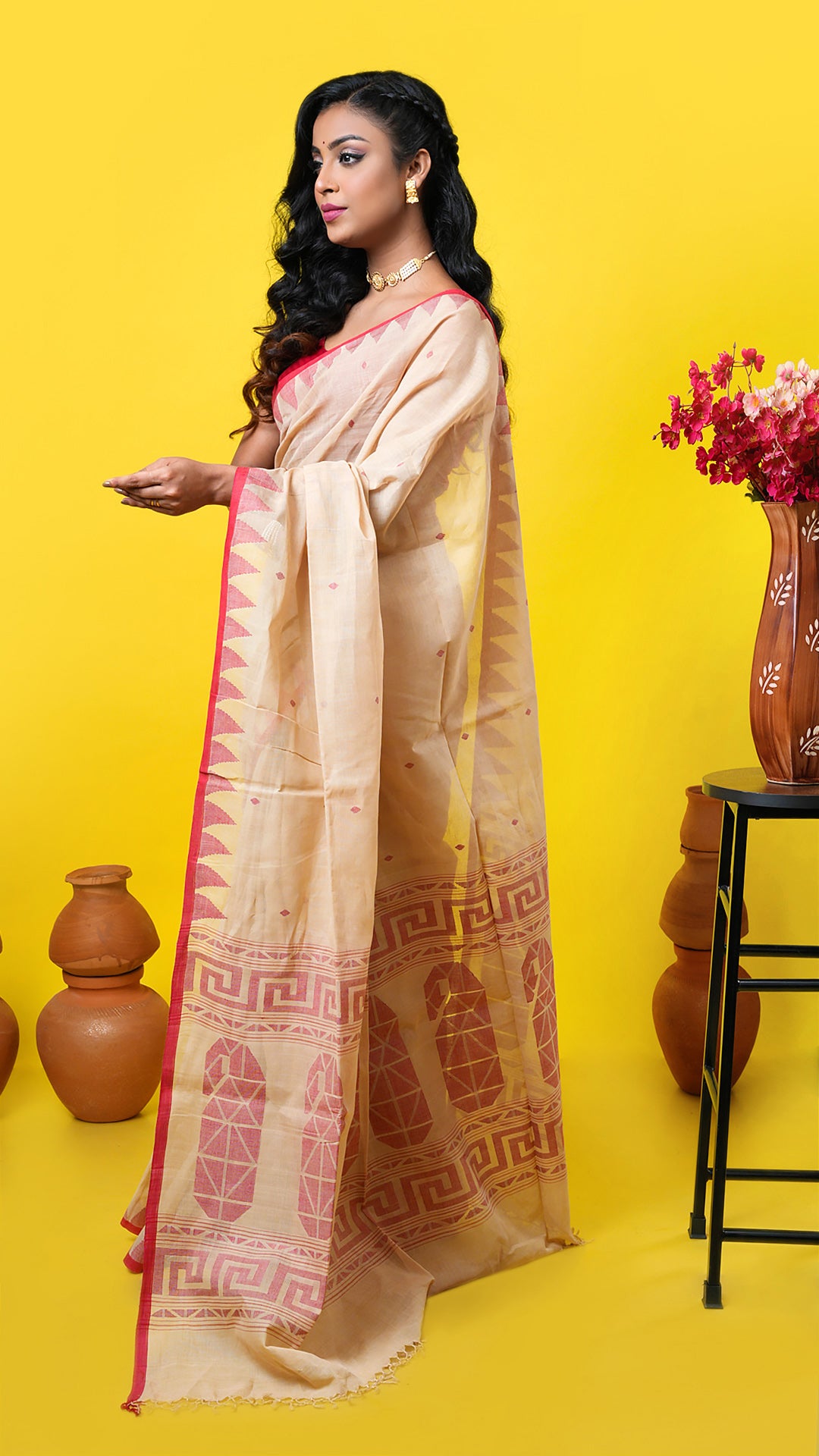 A beize temple border saree