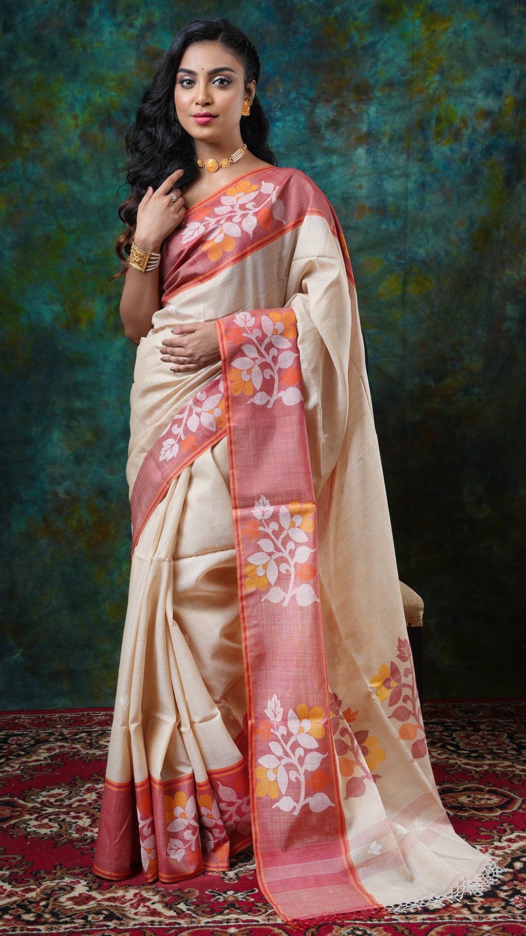 Tassar-cotton Dhakai saree with red border and dhakai motifs in off-white, red, and yellow. Price: Rs. 9000/-