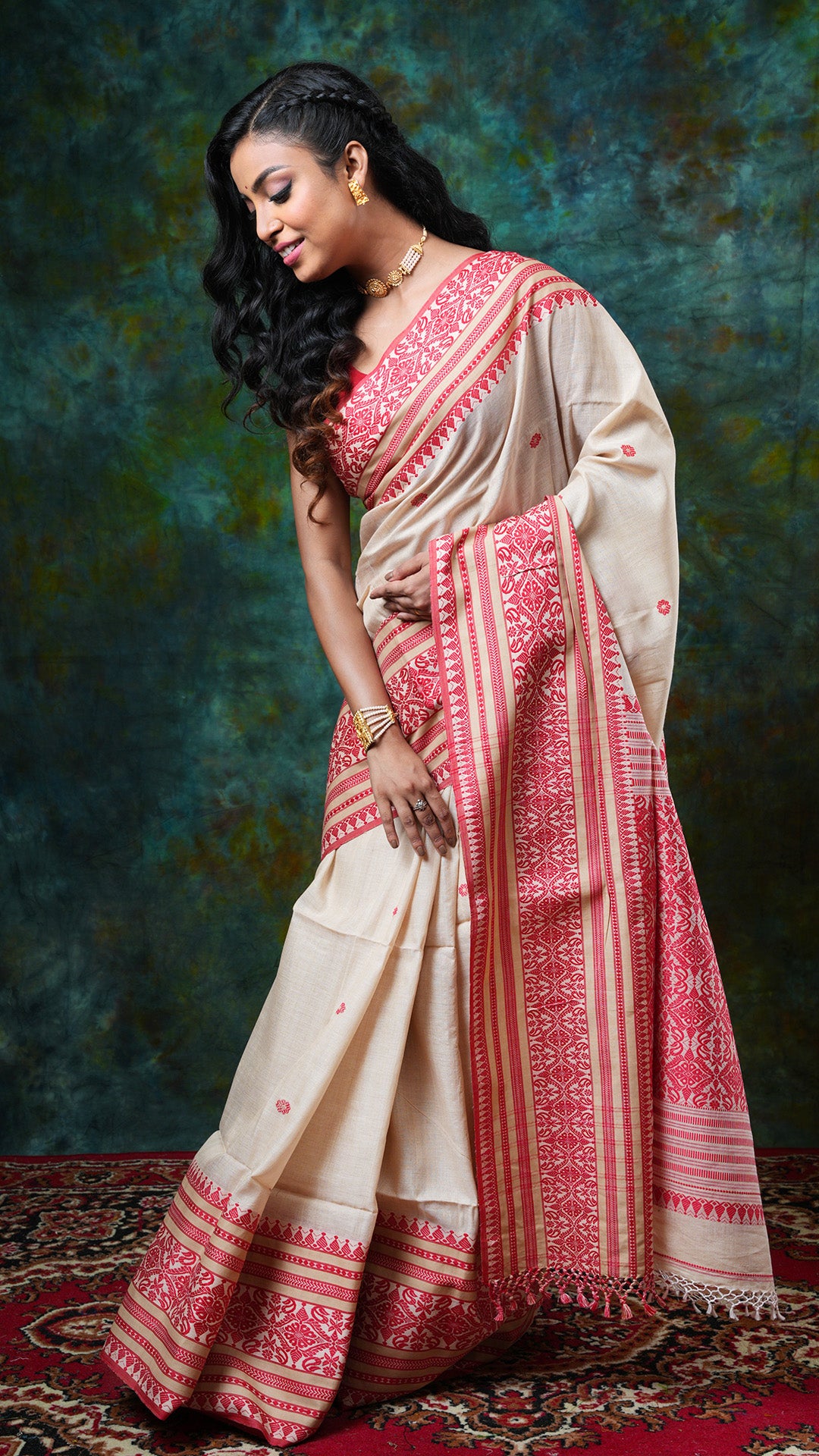 A tassar saree with red border