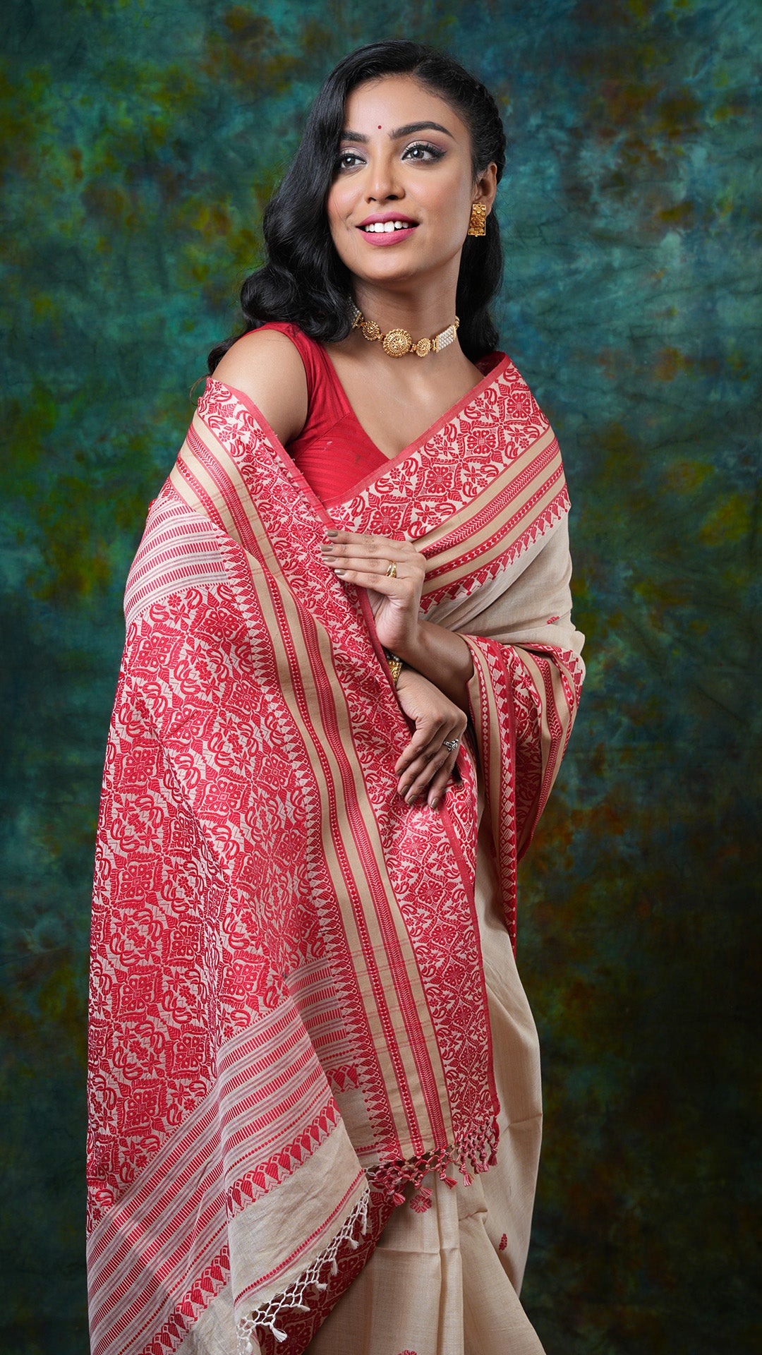 A tassar saree with red border