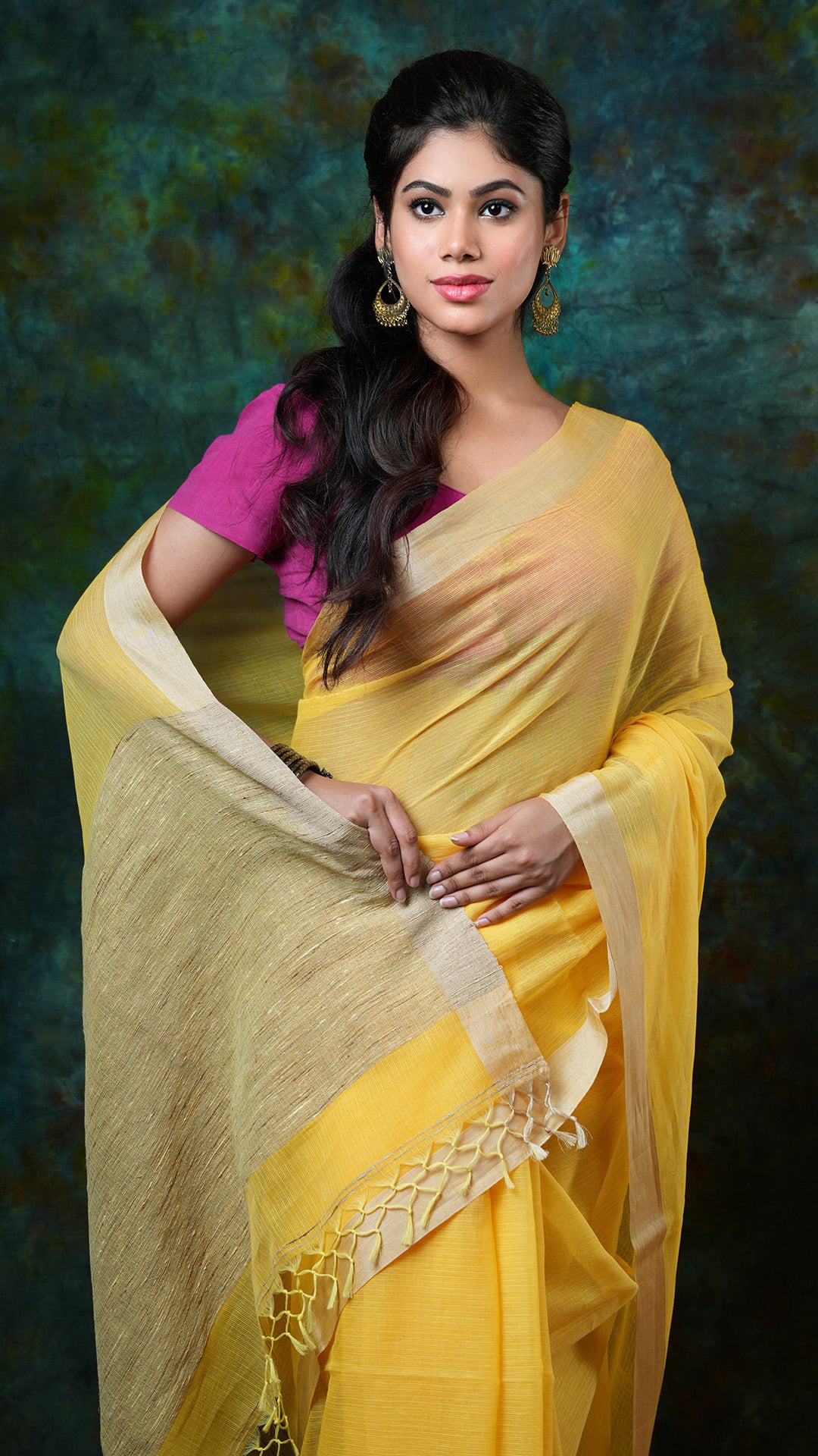 A canary yellow tangail saree