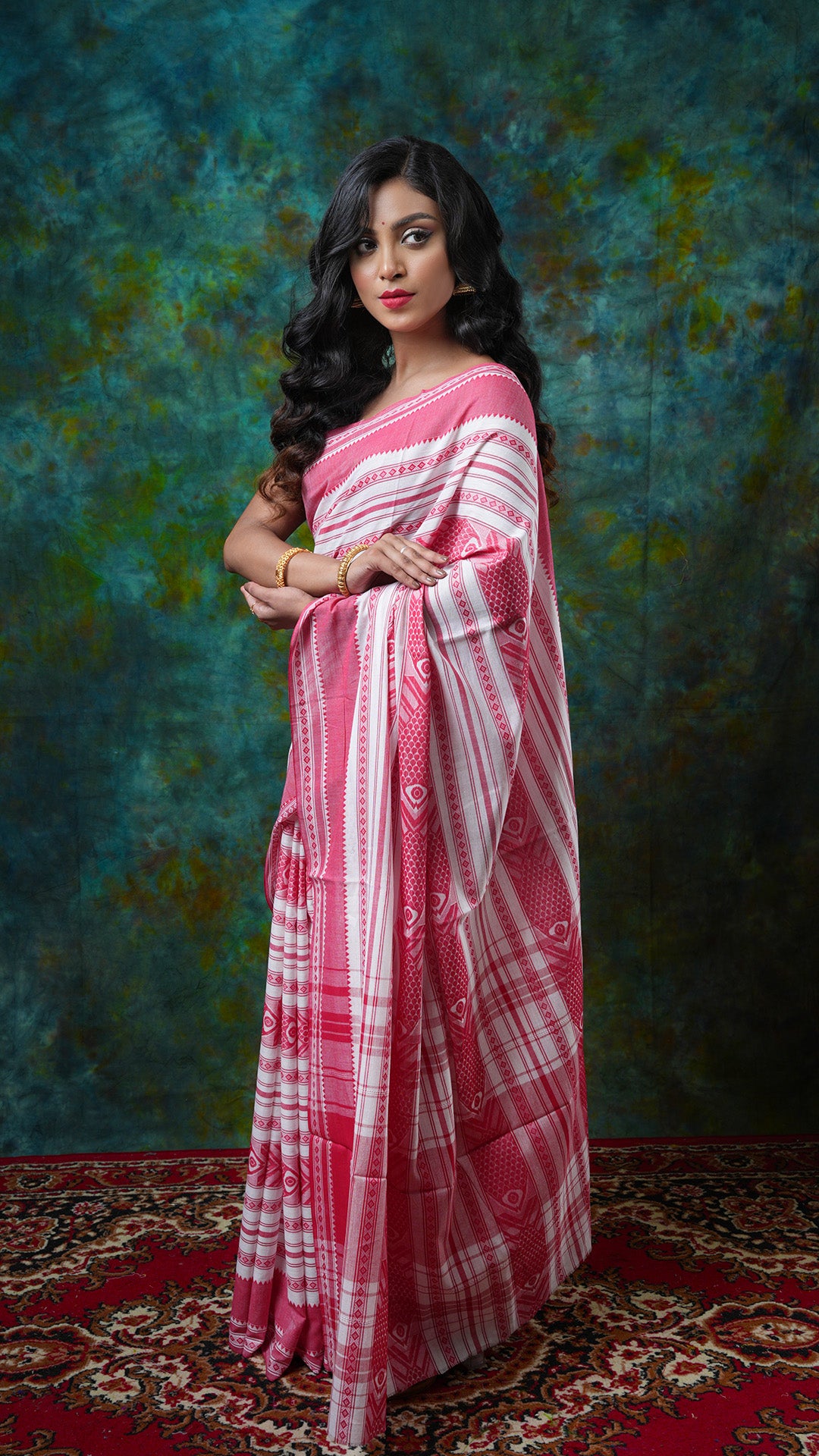 A off white red dhanekhali saree