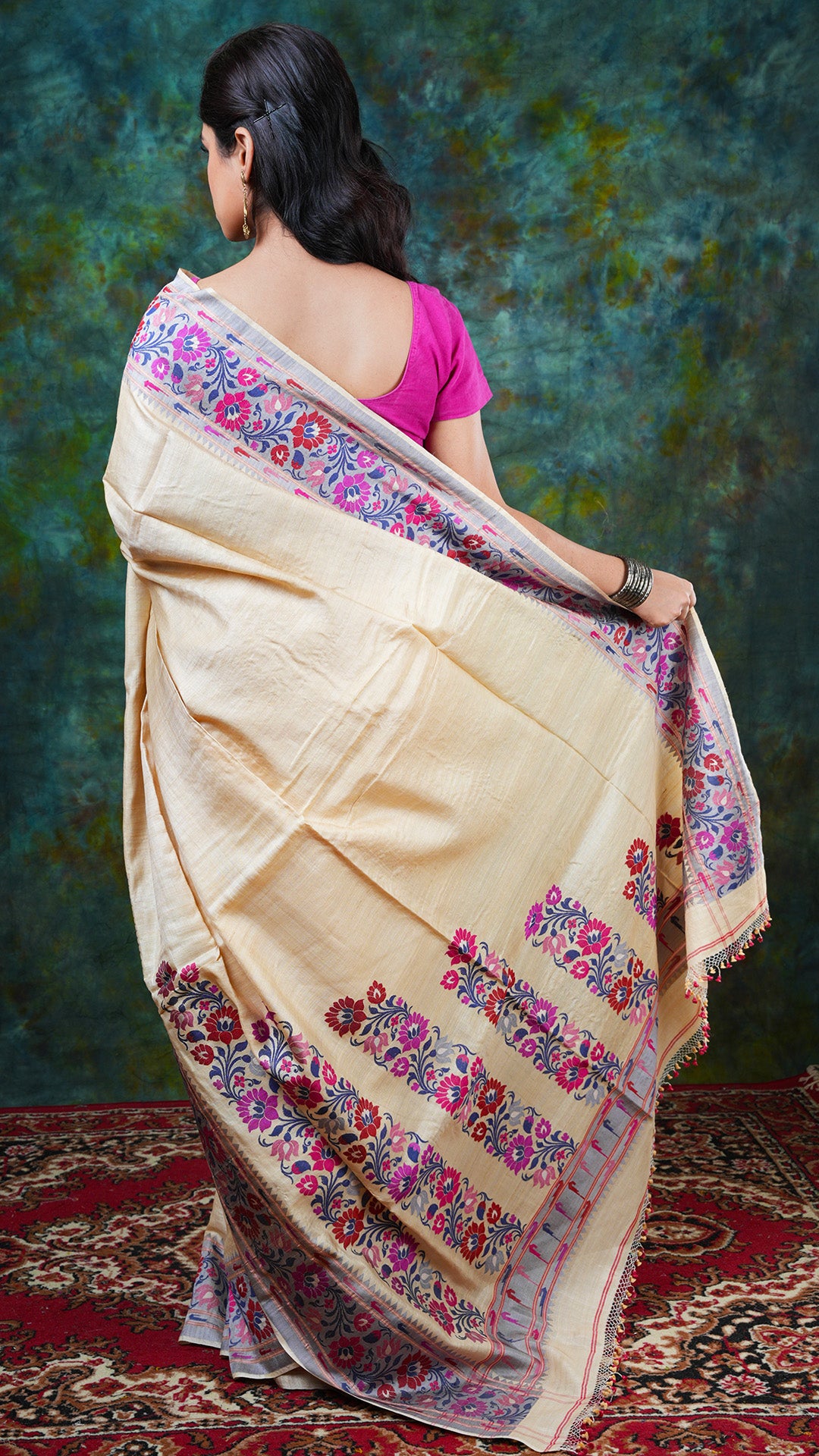 A tassar with inlay woven border