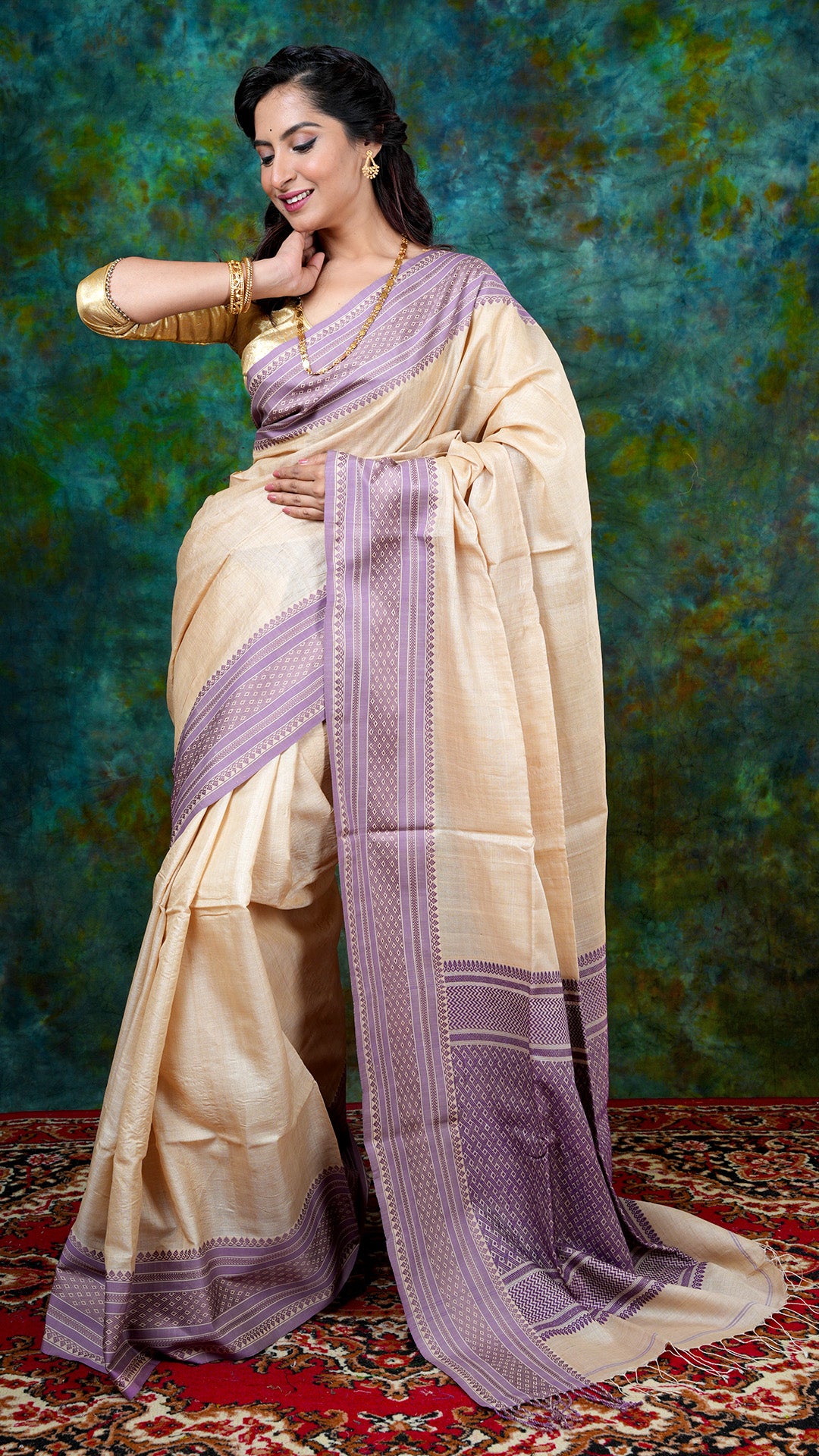 Tassar saree with mauve woven border and matching pallu, no butis. Price: Rs. 12000/-