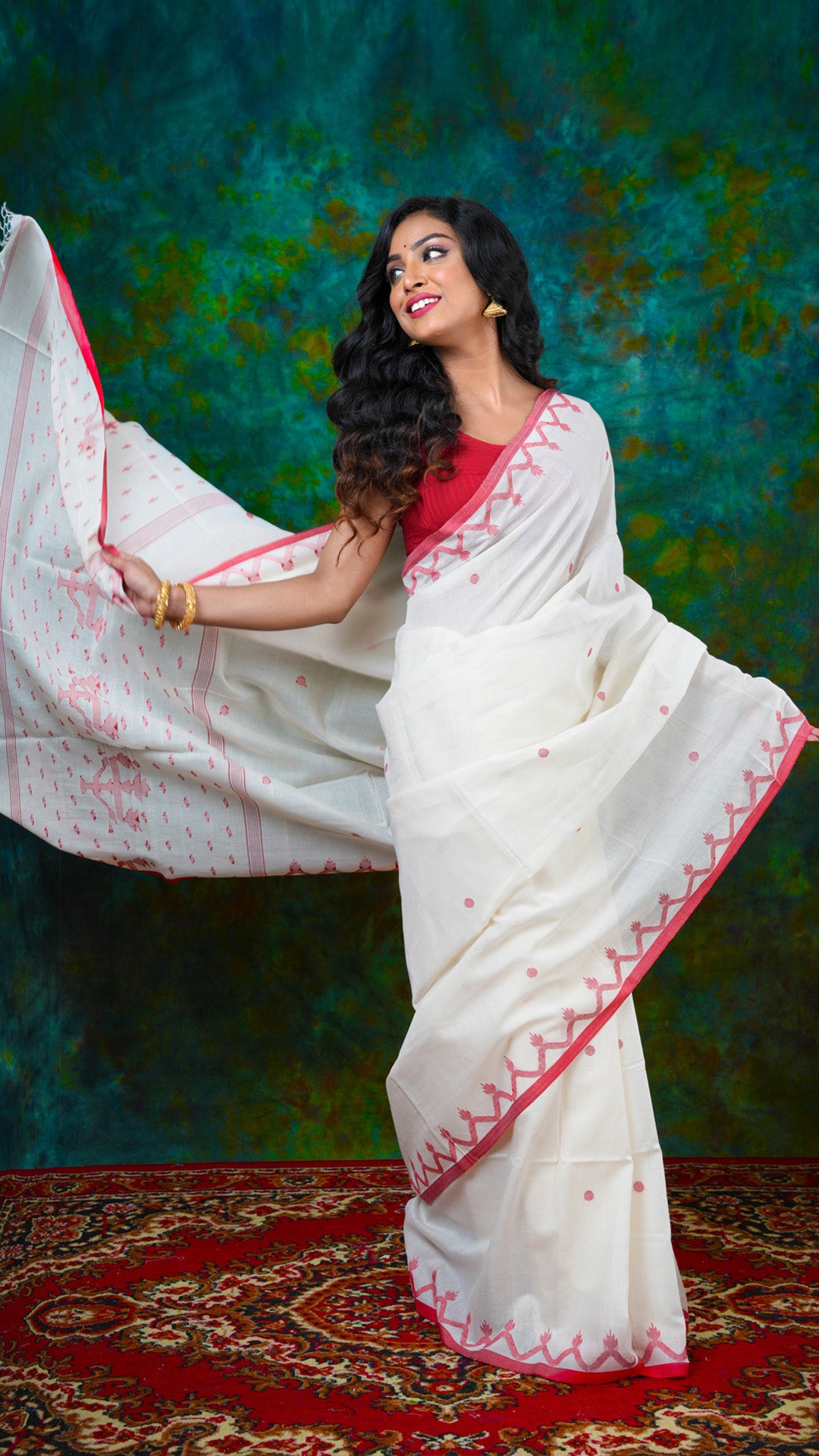 A off white and red dhakai saree