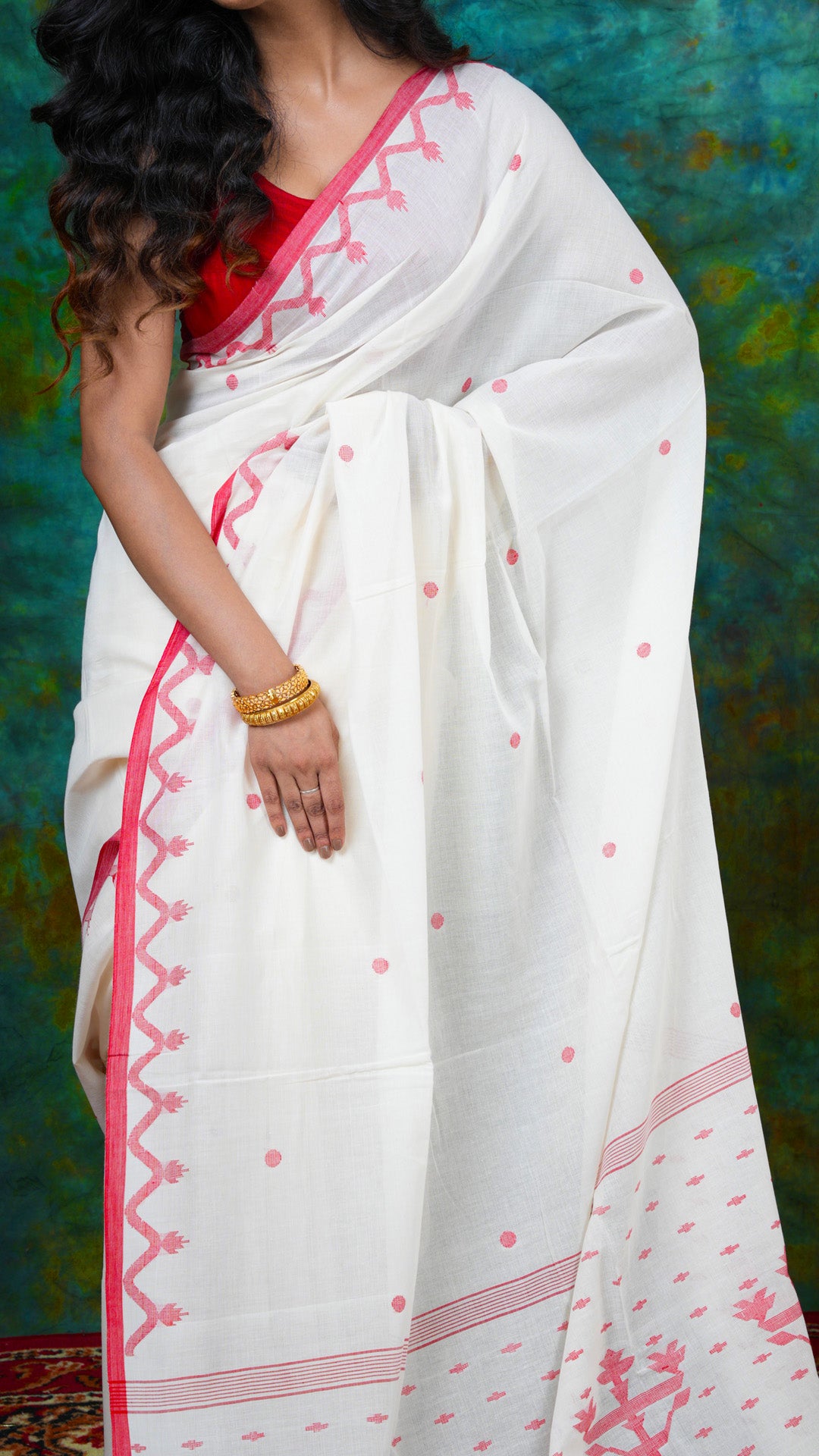 A off white and red dhakai saree