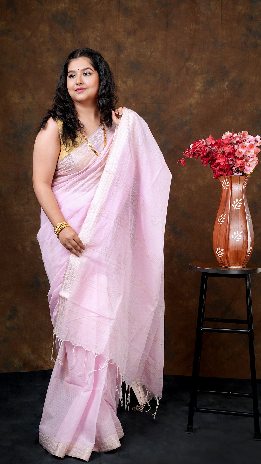 A light pink saree