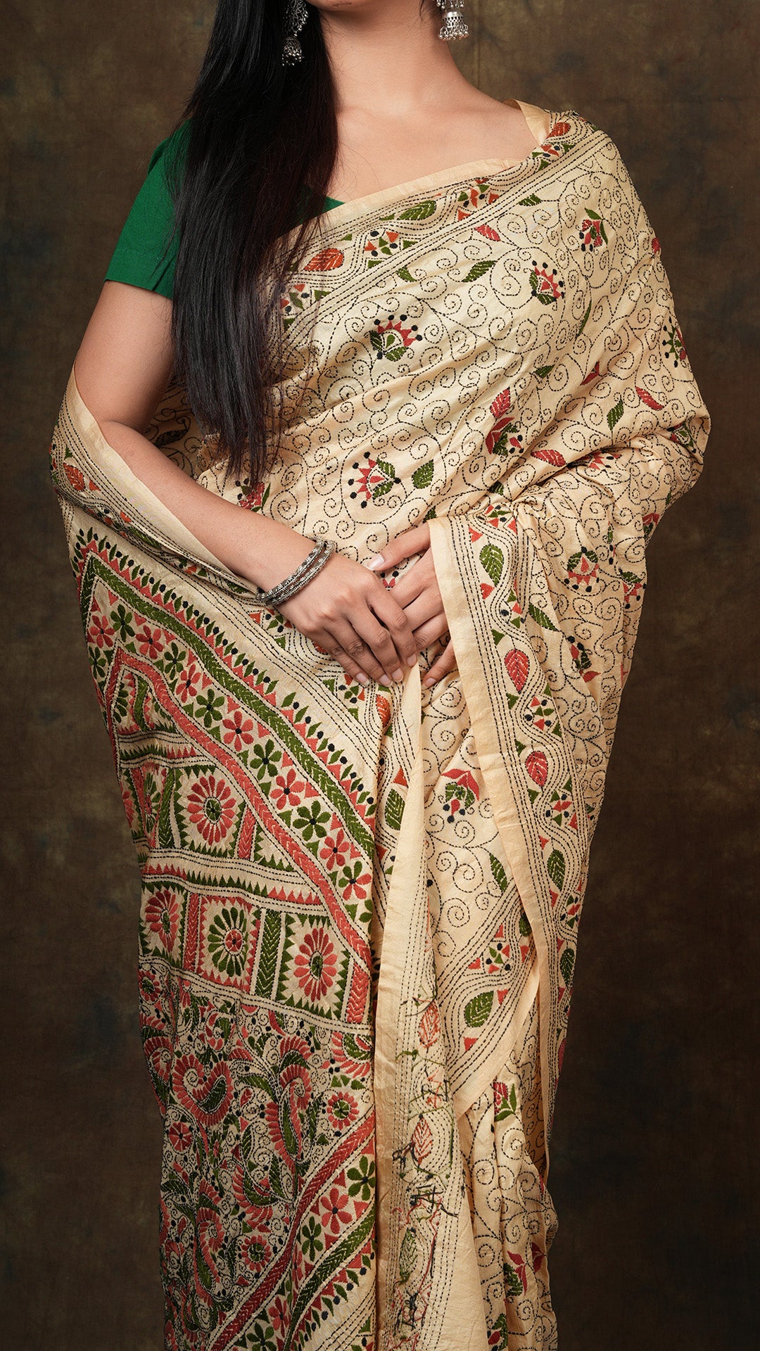 A kanta saree in dark beize colour