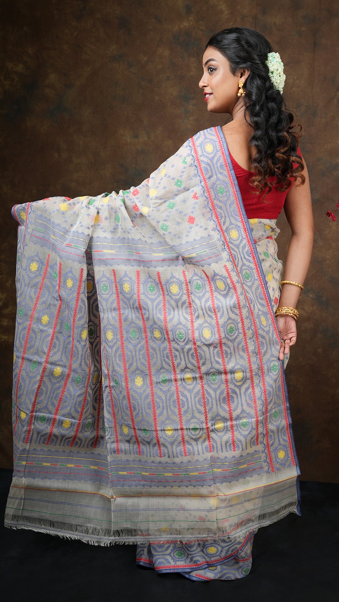 A blue multi coloured cotton jamdani saree