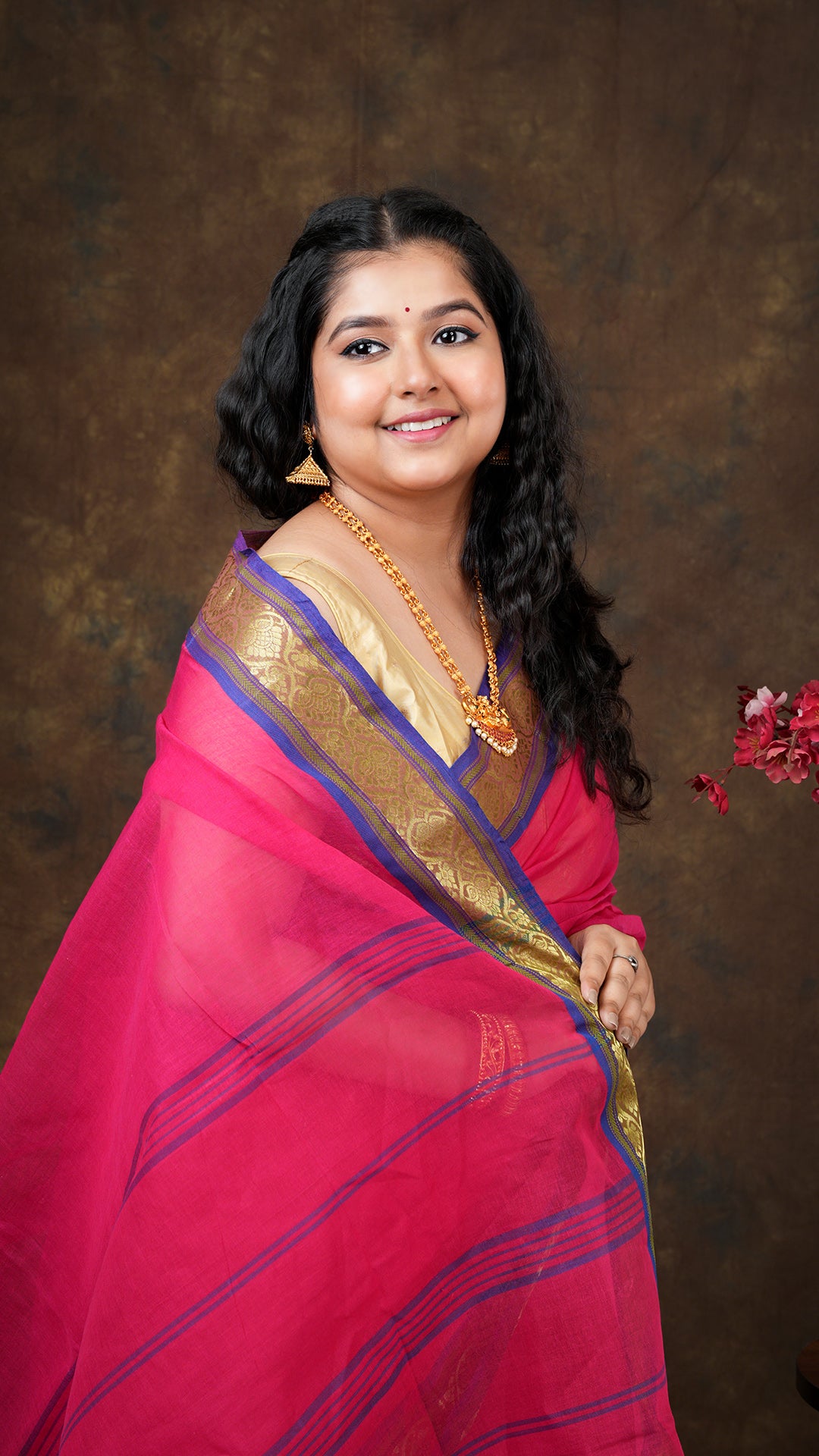 A dark rani tangail saree