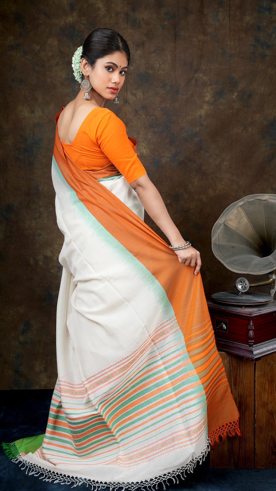 An off white with orange and green combination