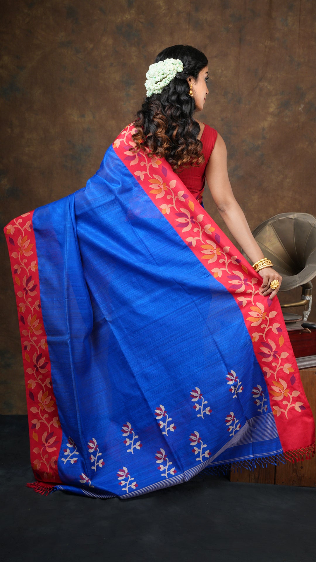 A royal blue raw silk saree