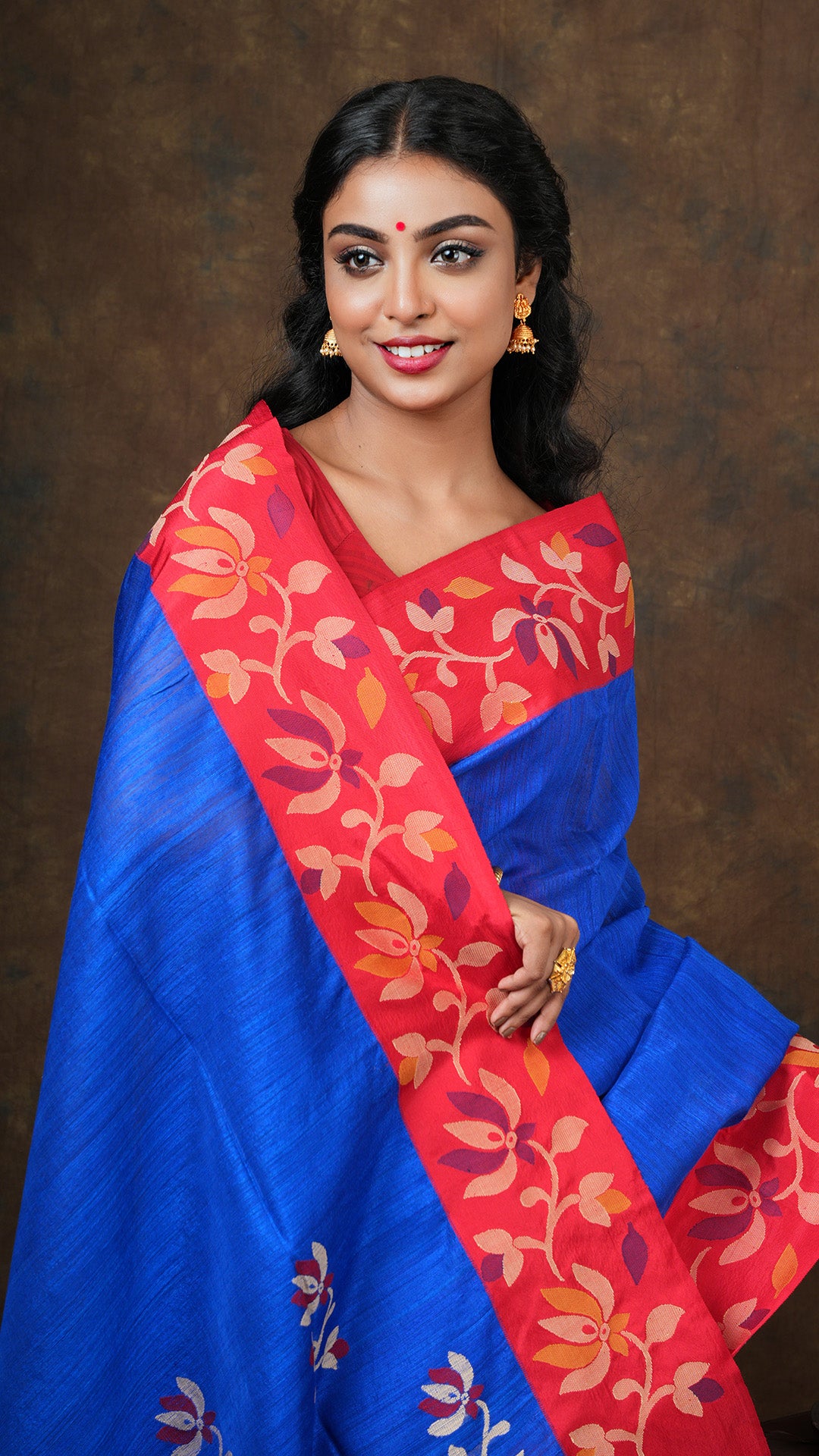 A royal blue raw silk saree